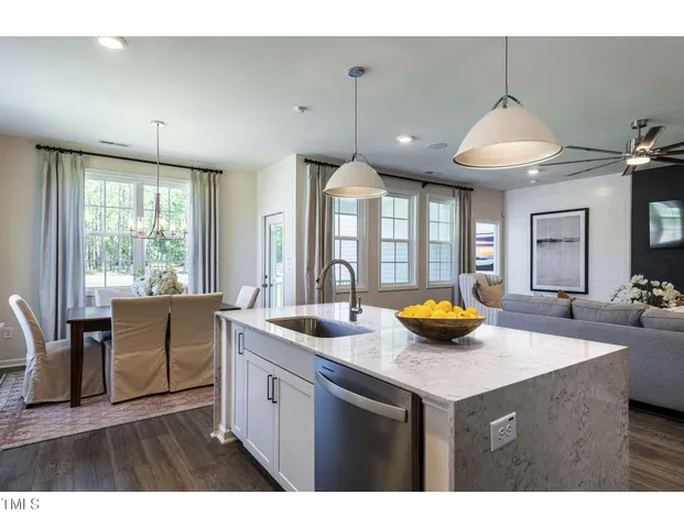 a kitchen with sink and window