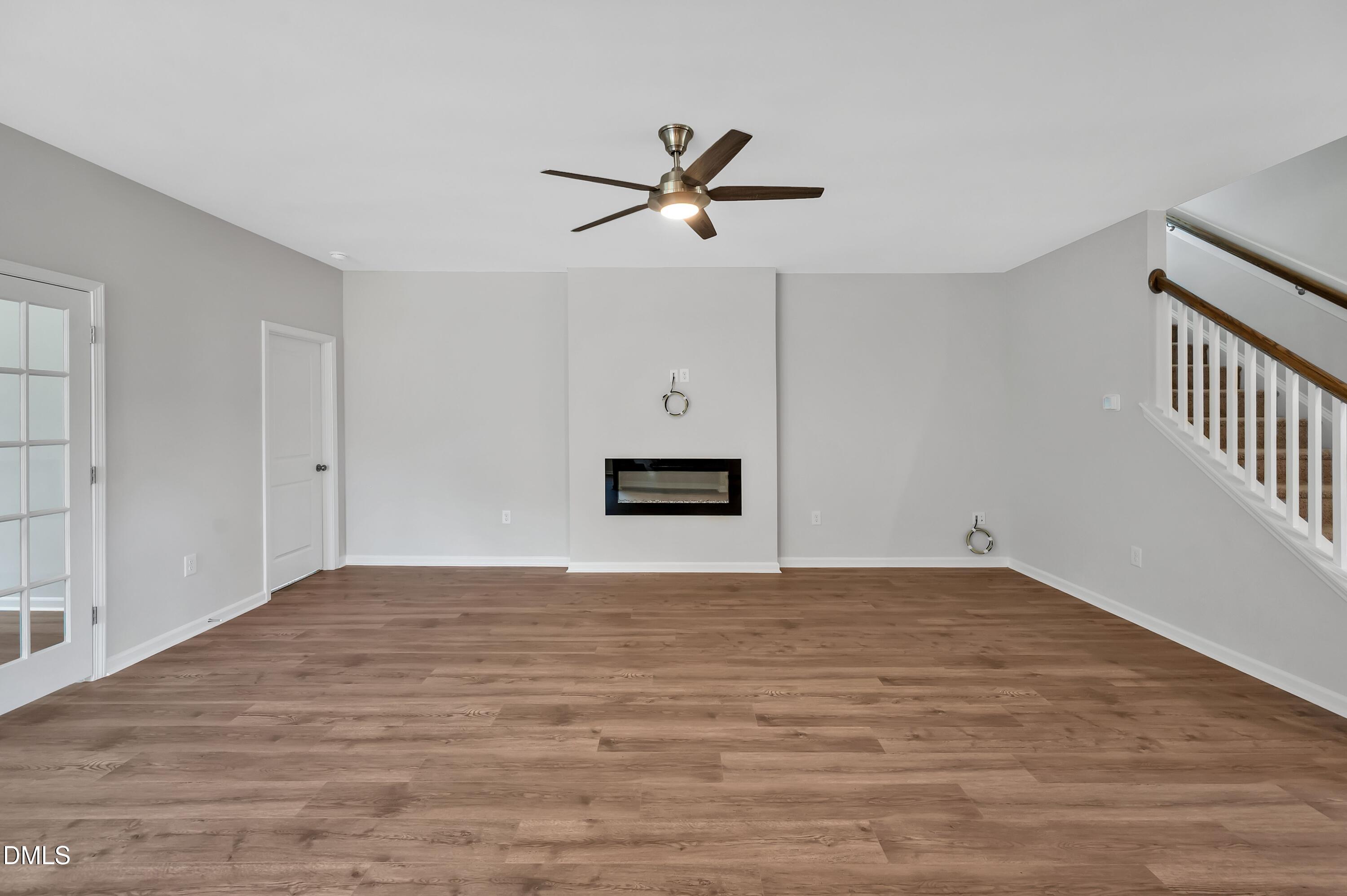 294 White Azalea Way Benson, NC 27504 - Photo 4 of 15 a view of an empty room with a window