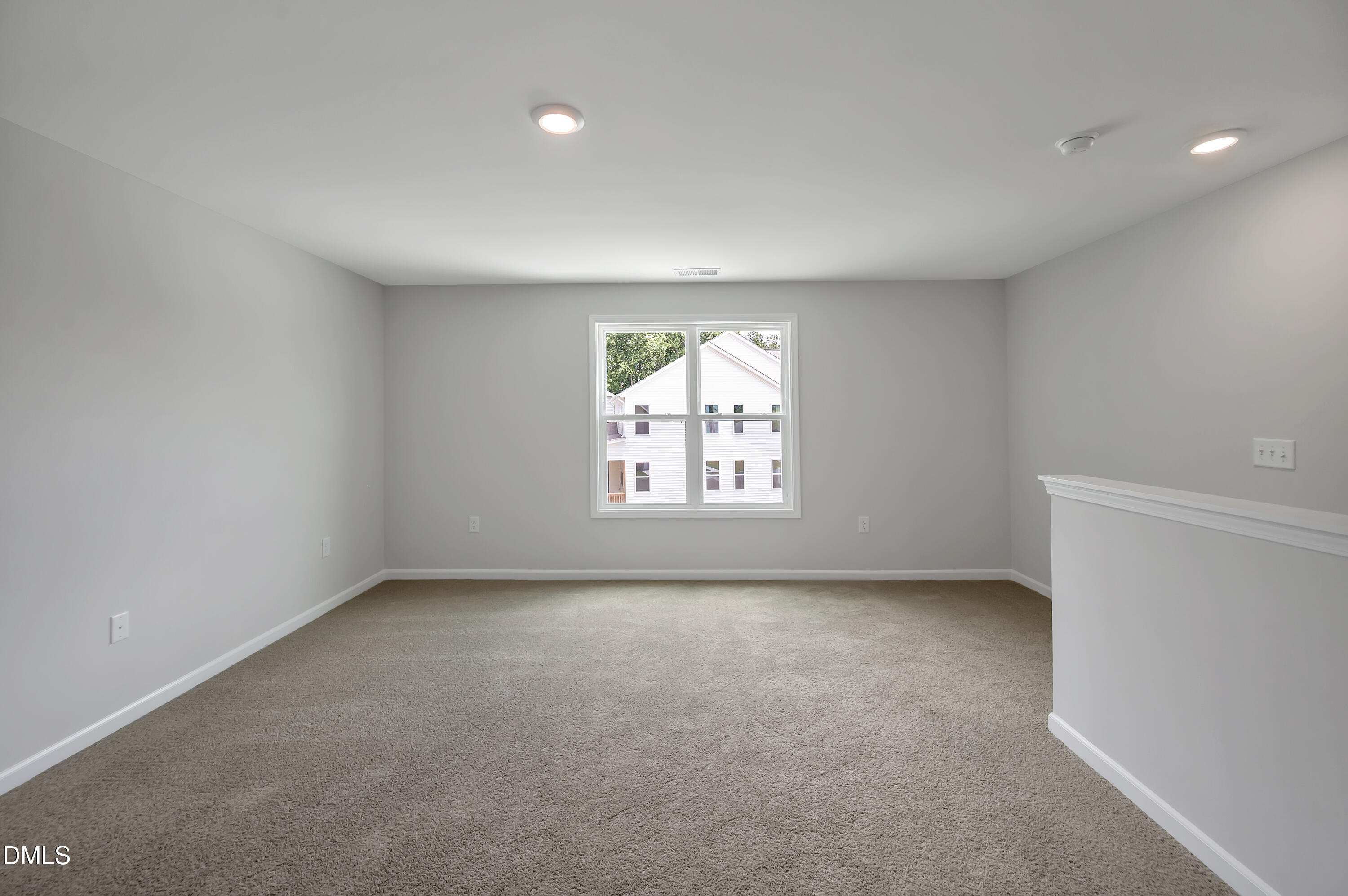 294 White Azalea Way Benson, NC 27504 - Photo 8 of 15 an empty room with a window