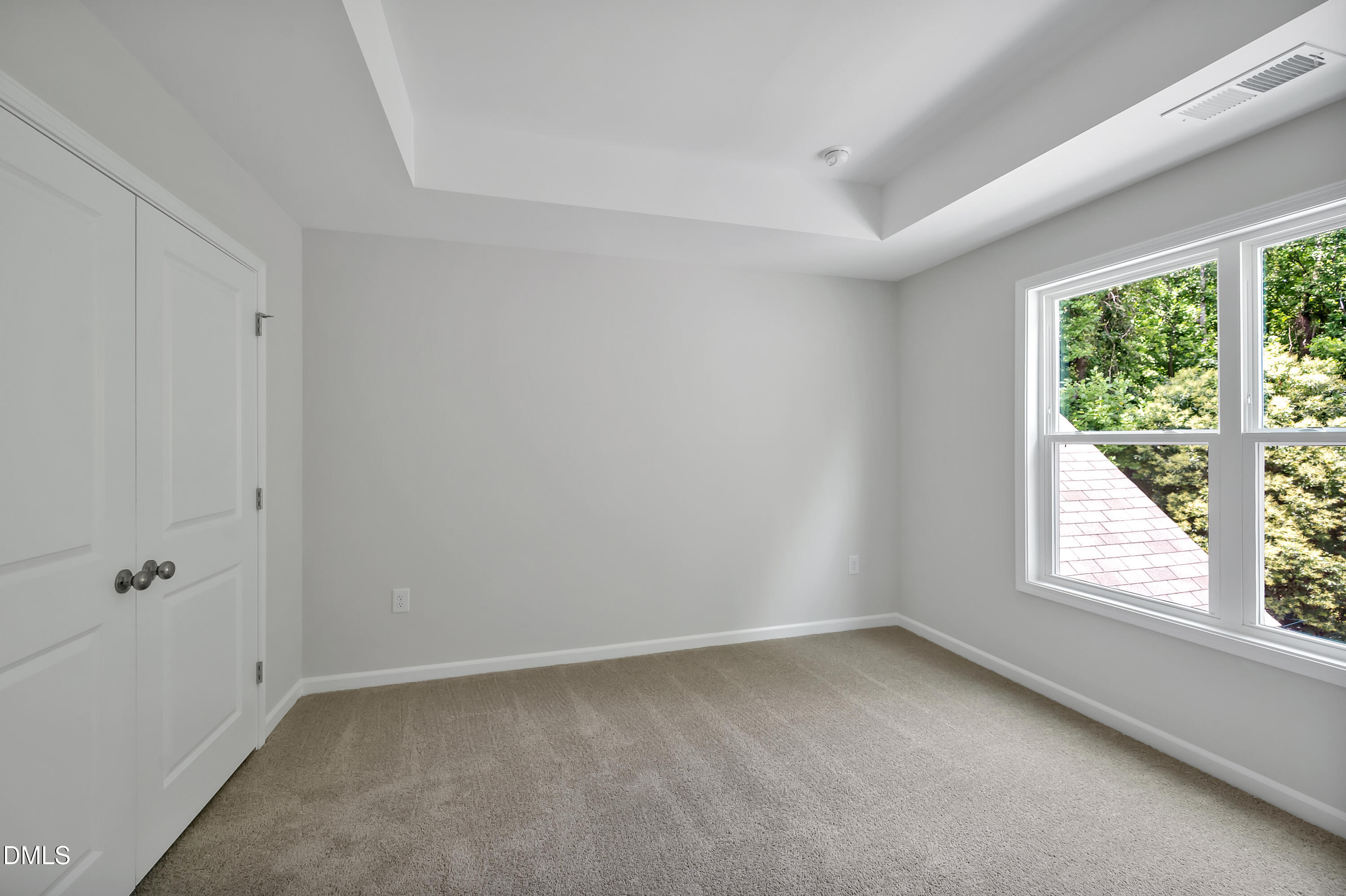 294 White Azalea Way Benson, NC 27504 - Photo 10 of 15 an empty room with a window