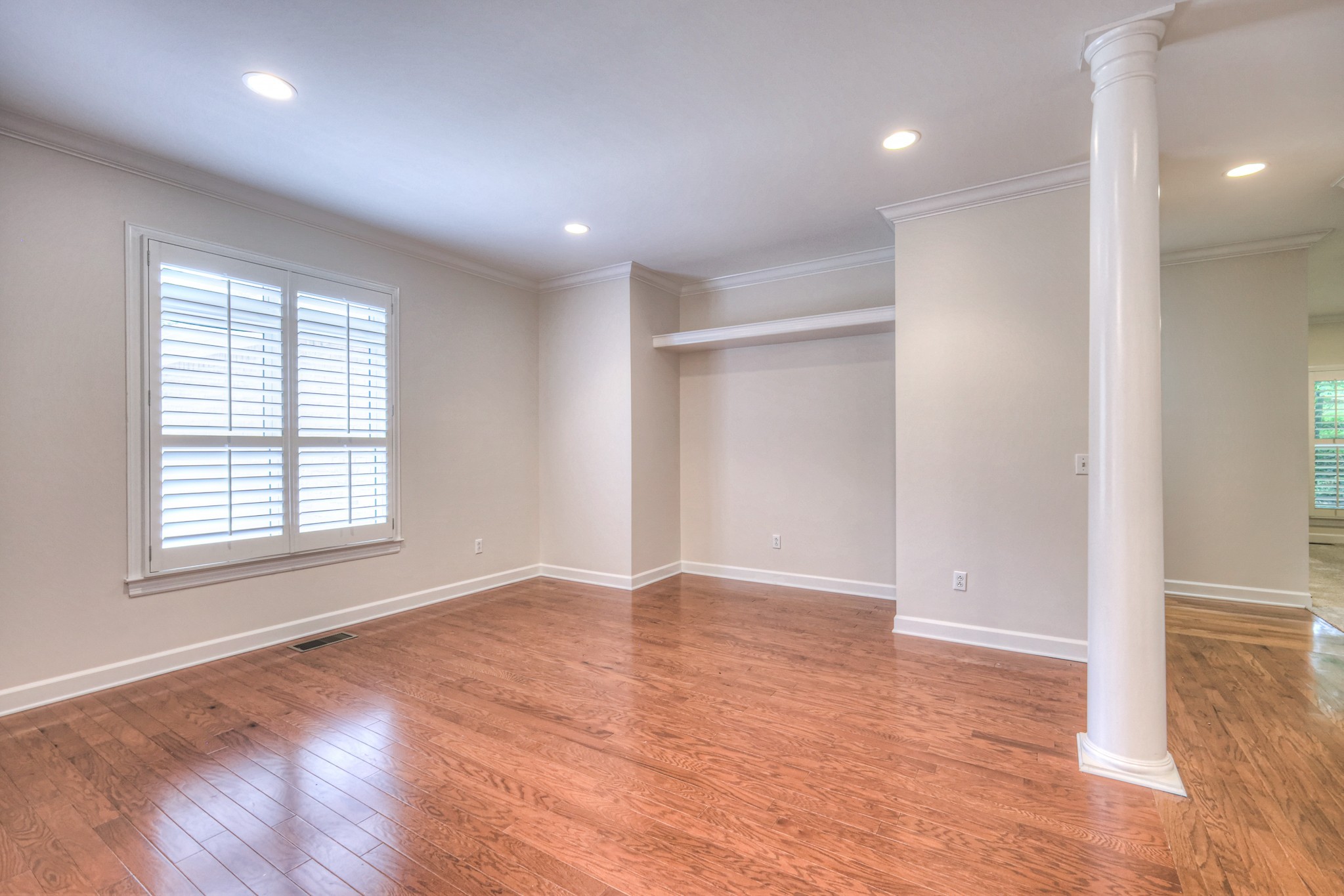 604 Georgian Way Mount Juliet, TN 37122 - Photo 11 of 58 an empty room with wooden floor and windows
