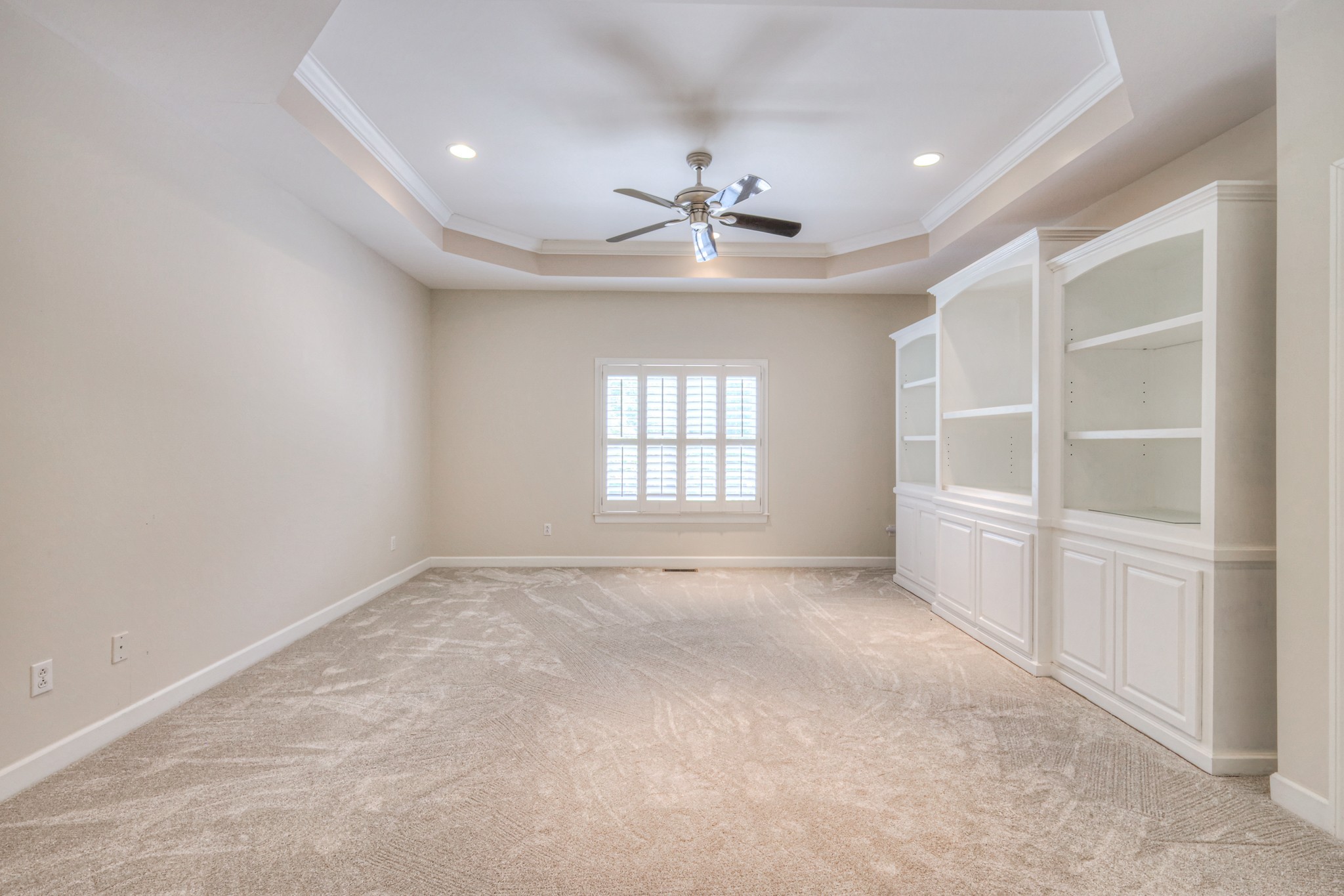 604 Georgian Way Mount Juliet, TN 37122 - Photo 16 of 58 an empty room with windows and chandelier fan