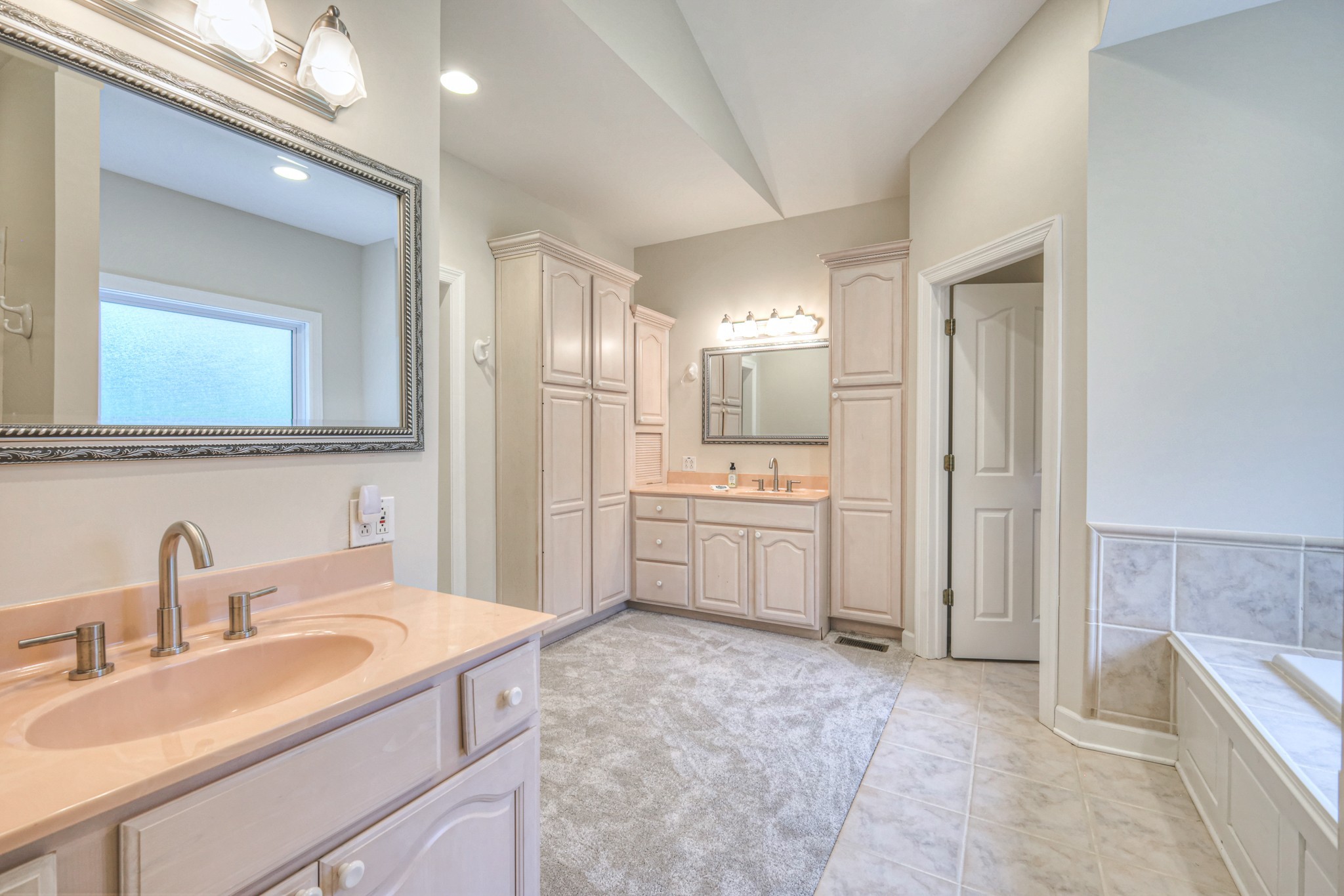 604 Georgian Way Mount Juliet, TN 37122 - Photo 21 of 58 a bathroom with a sink a toilet a mirror and vanity