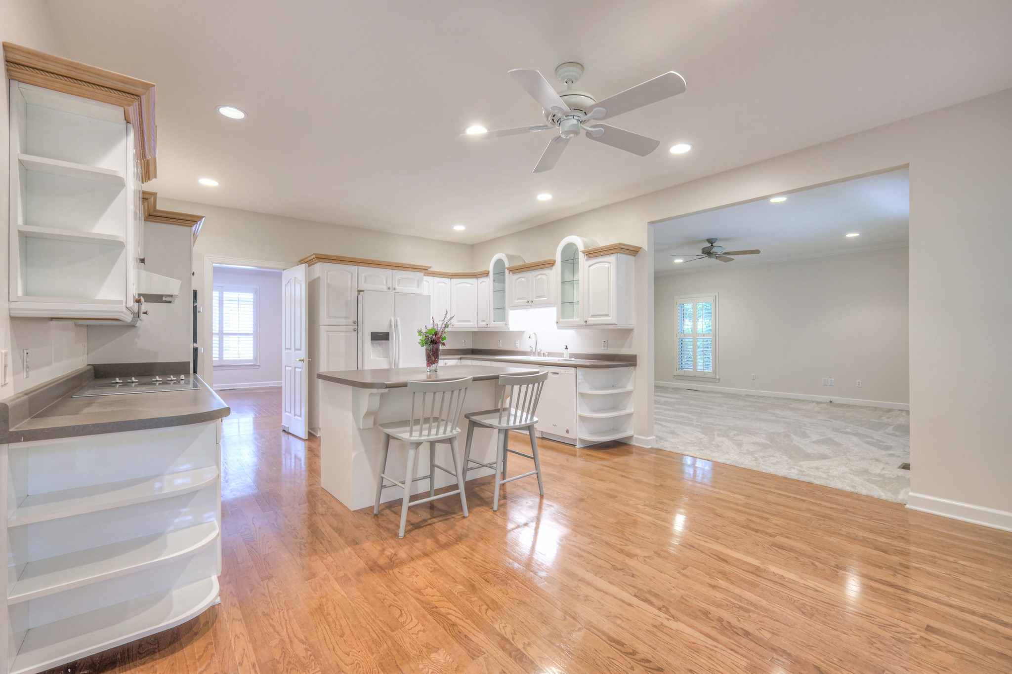 604 Georgian Way Mount Juliet, TN 37122 - Photo 31 of 58 a kitchen with stainless steel appliances kitchen island granite countertop a stove a sink and a refrigerator