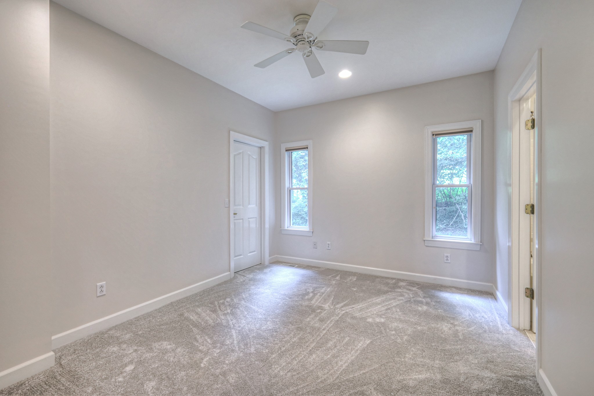 604 Georgian Way Mount Juliet, TN 37122 - Photo 39 of 58 an empty room with windows and fan