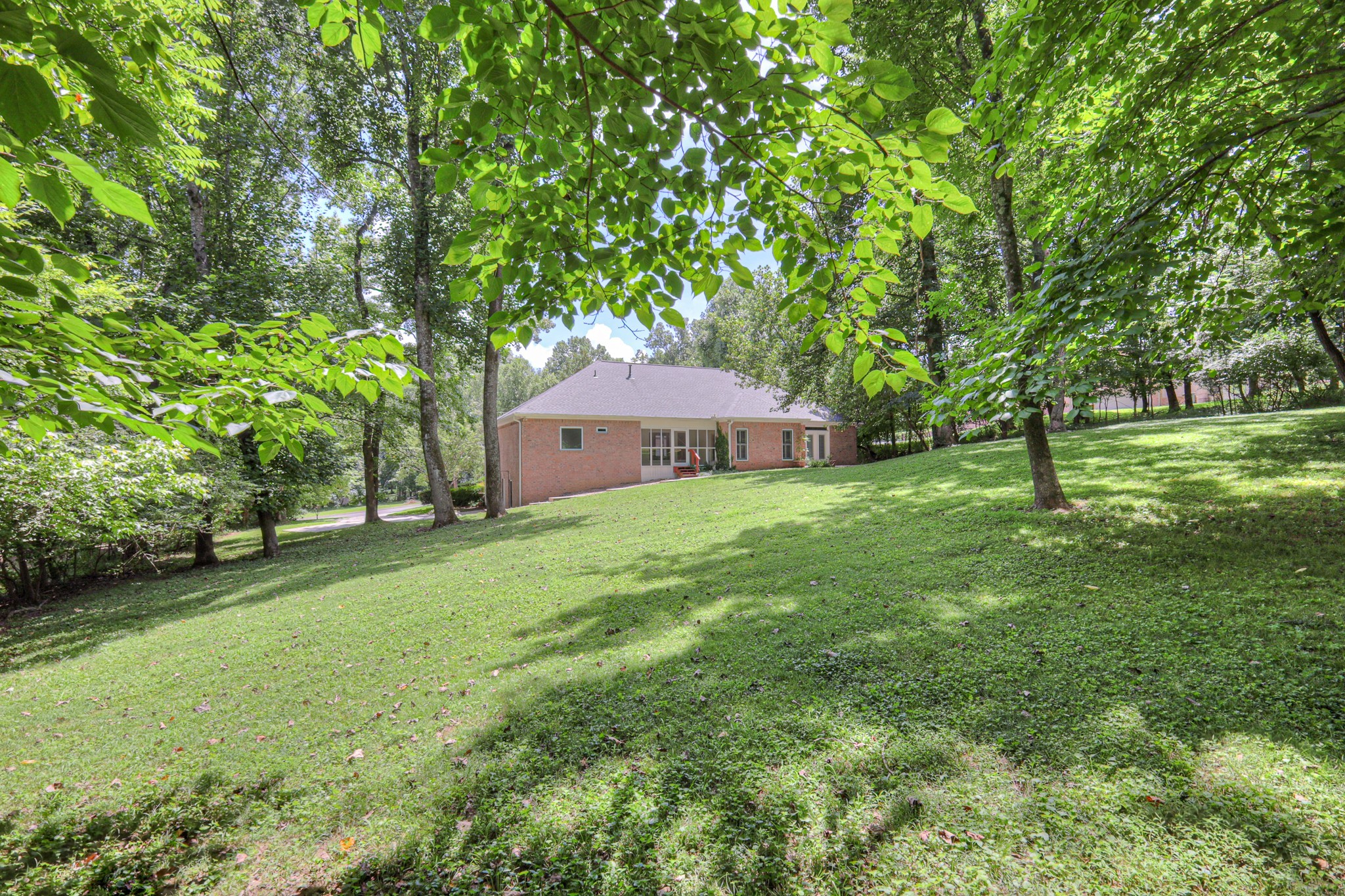 604 Georgian Way Mount Juliet, TN 37122 - Photo 57 of 58 a front view of a house with garden