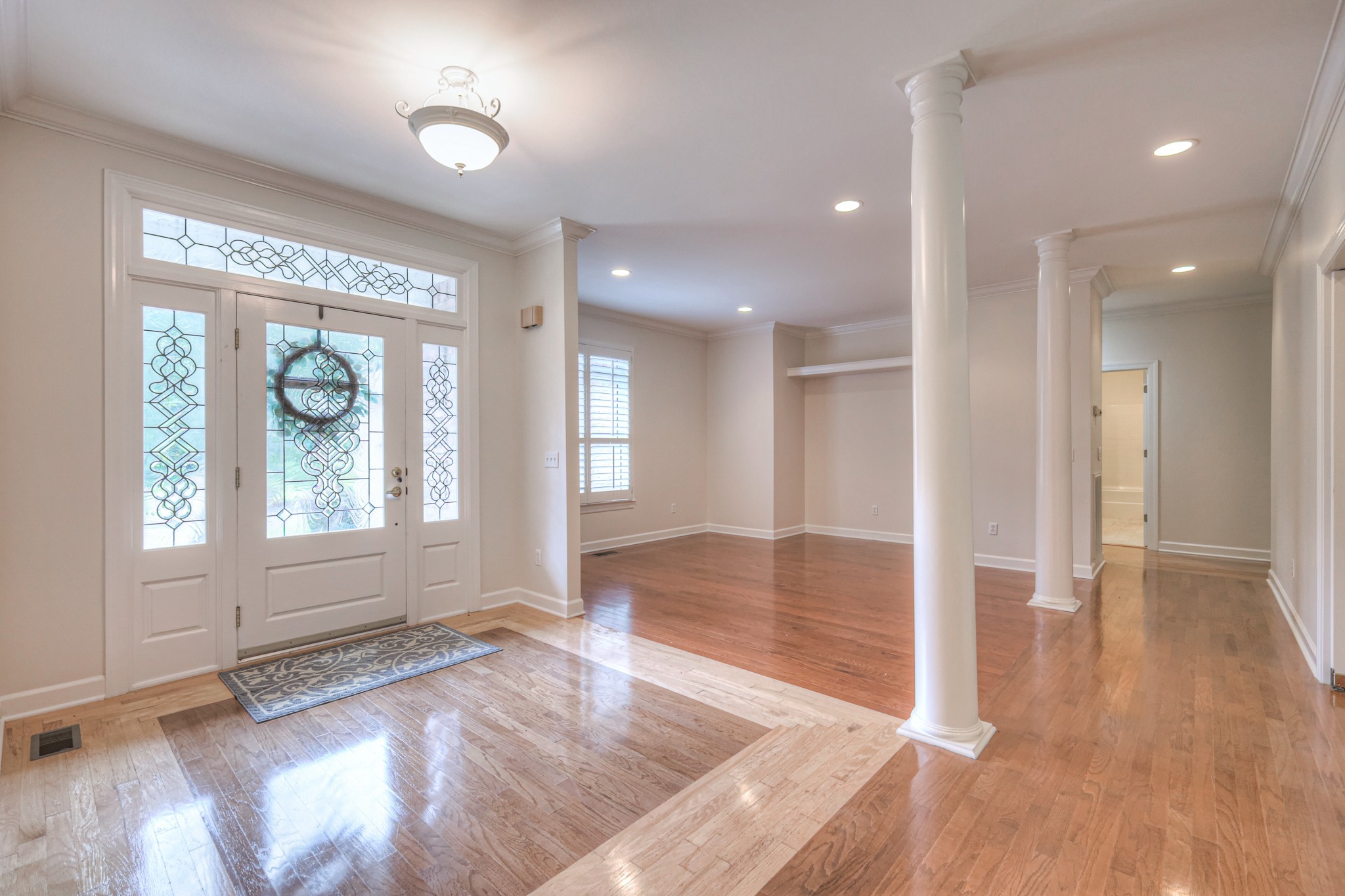 604 Georgian Way Mount Juliet, TN 37122 - Photo 8 of 58 an empty room with wooden floor and windows