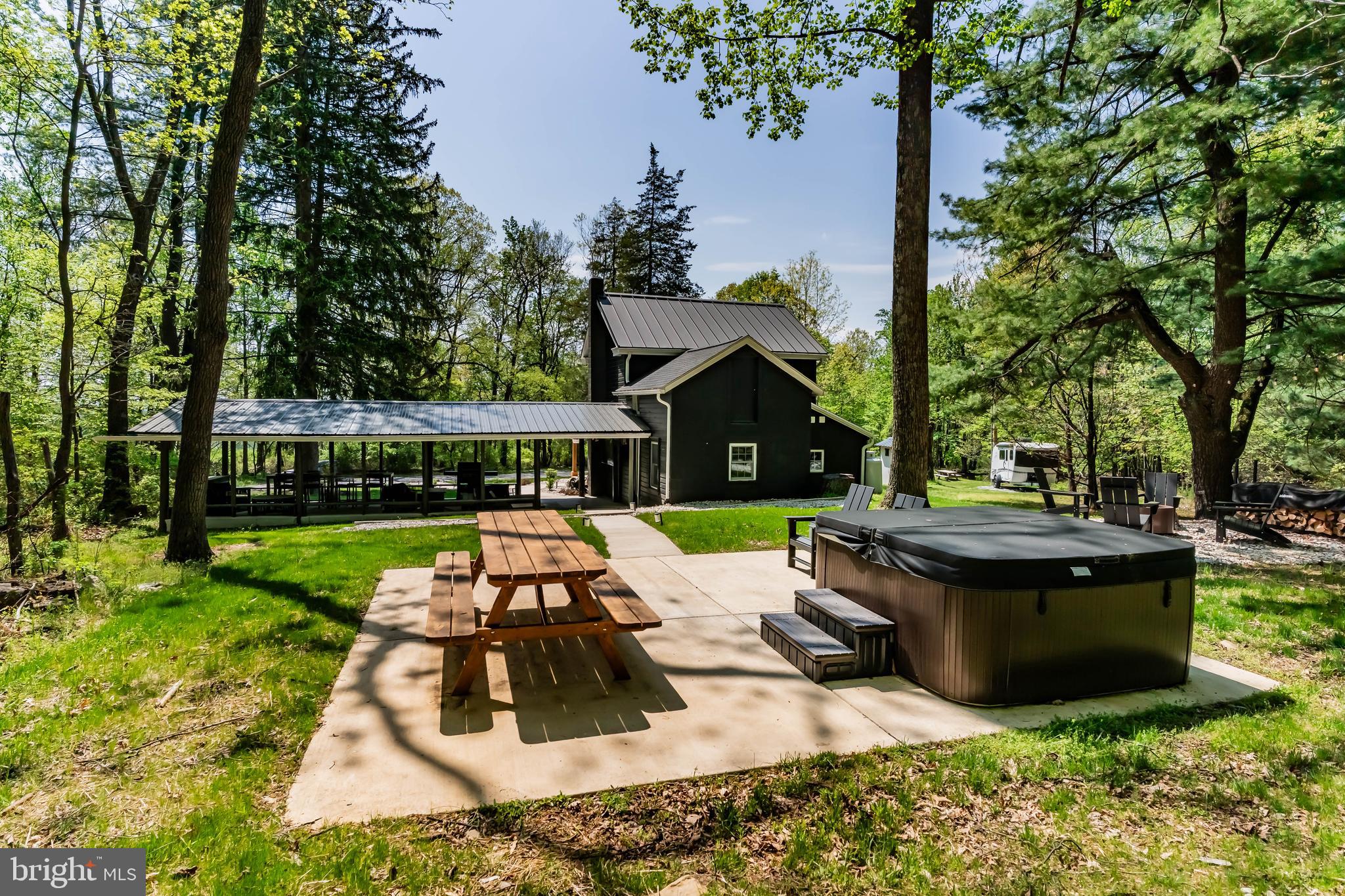1134 South Mountain Road Dillsburg, PA 17019 - Photo 12 of 66 a view of a house with backyard sitting area and garden