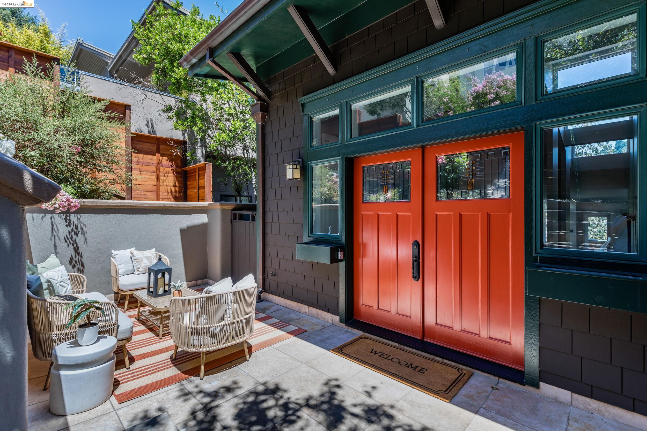 a outdoor space with a couch and chairs