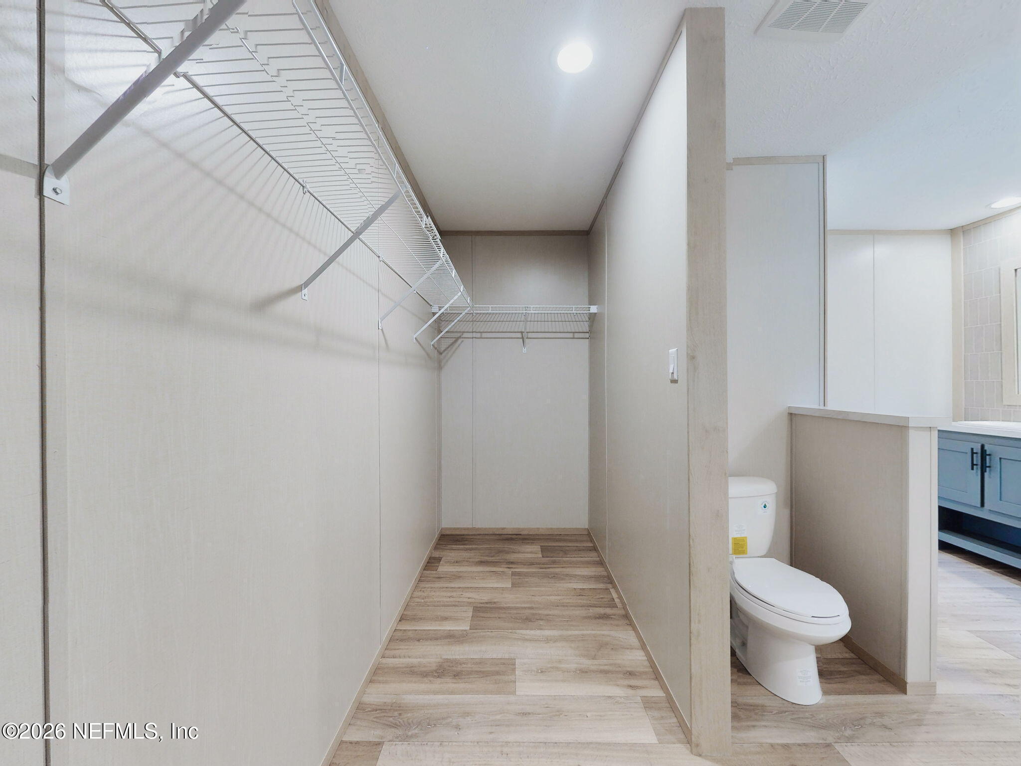 5784 County Road 214 Keystone Heights, FL 32656 - Photo 19 of 62 a bathroom with a toilet and a shower