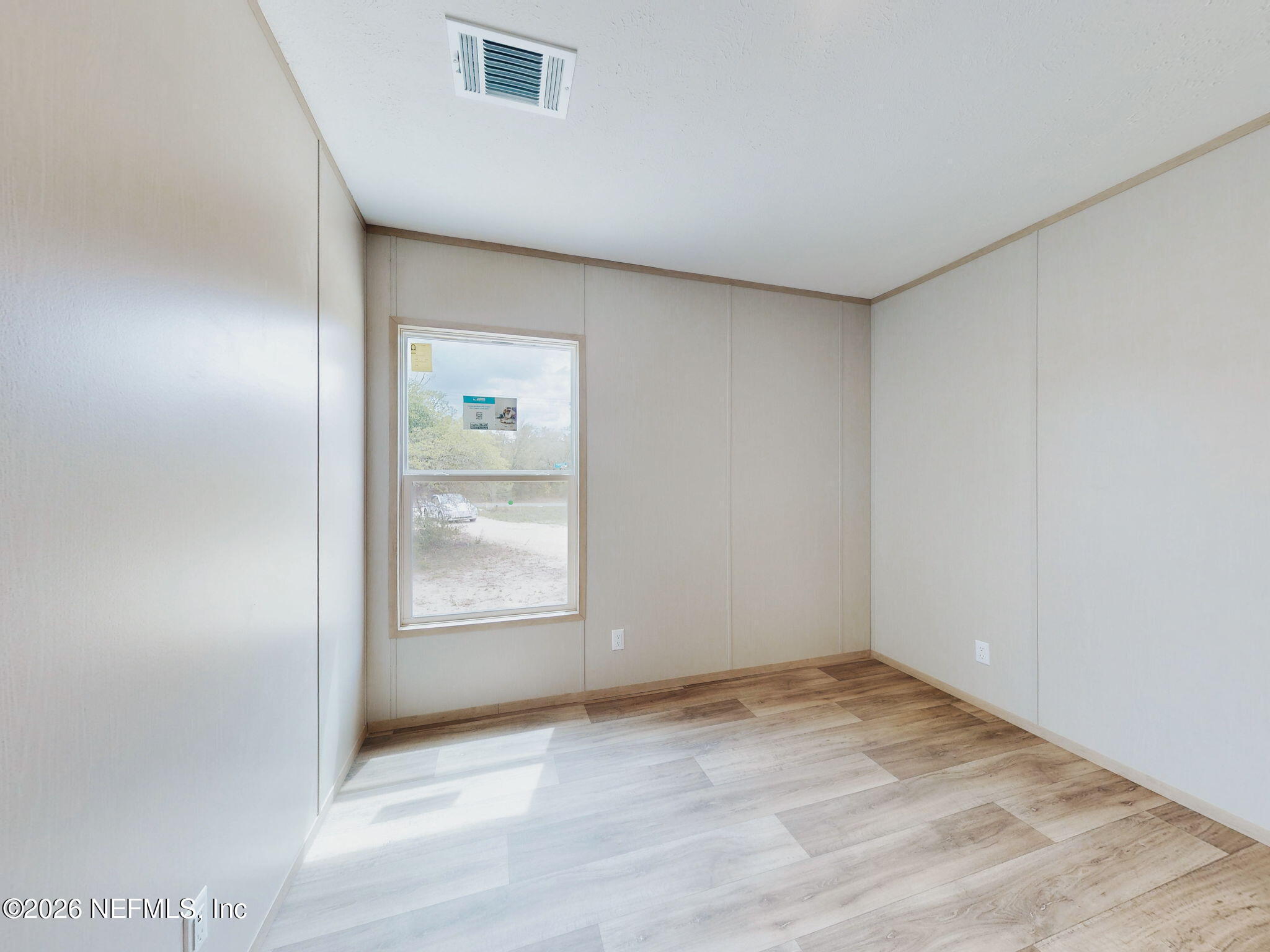 5784 County Road 214 Keystone Heights, FL 32656 - Photo 44 of 62 a view of an empty room and window