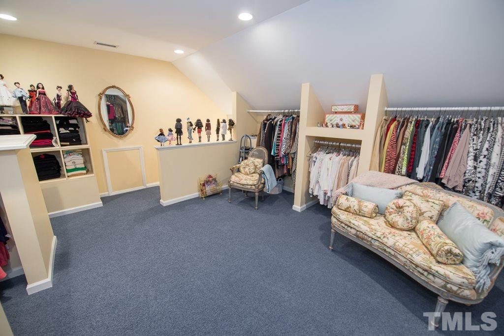 103 Springmoor Lane Durham, NC 27713 - Photo 18 of 25 The third floor has been permitted and finished. It is currently being used as a boutique-style closet.