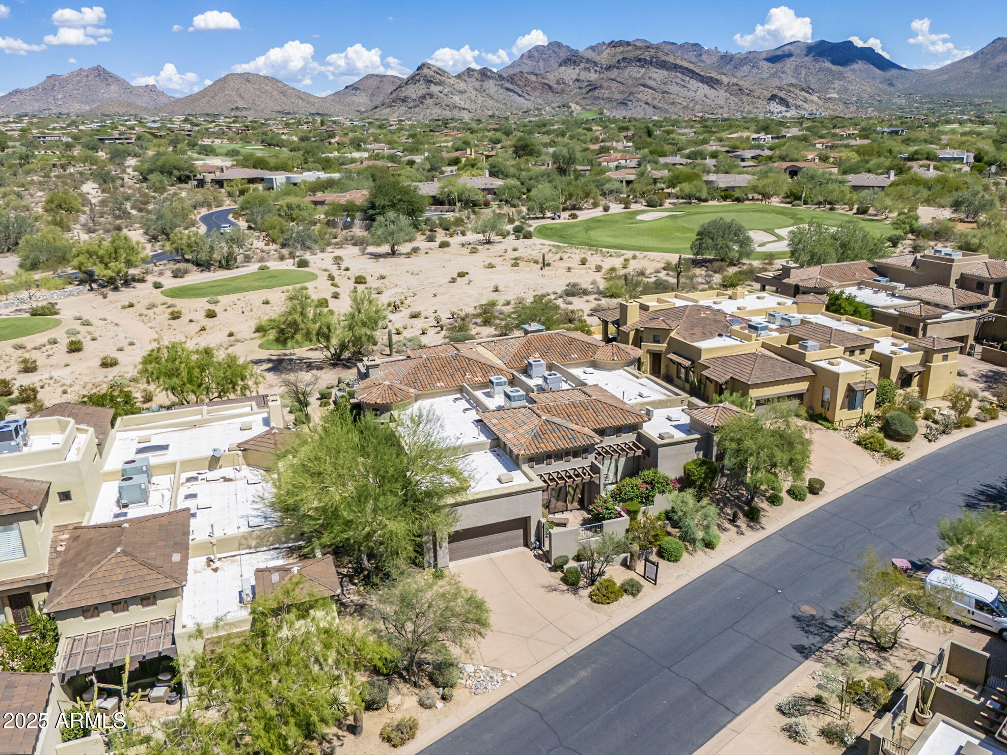 9270 East Thompson Peak Parkway, Unit 342 Scottsdale, AZ 85255 - Photo 1 of 40 an aerial view of residential houses with outdoor space and street view