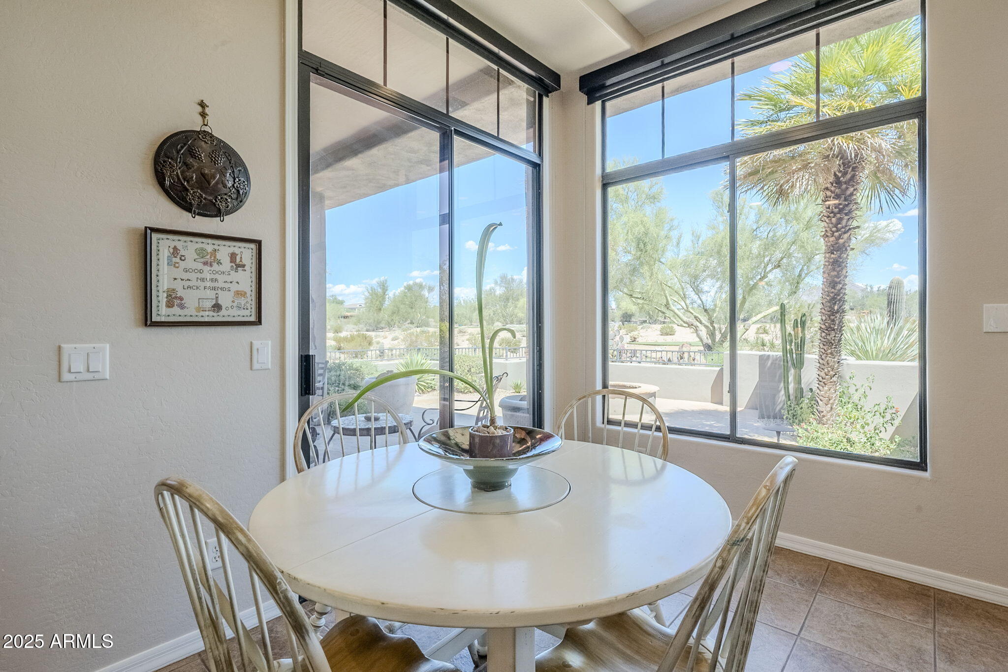 9270 East Thompson Peak Parkway, Unit 342 Scottsdale, AZ 85255 - Photo 18 of 40 a view of a dining room with furniture window and outside view