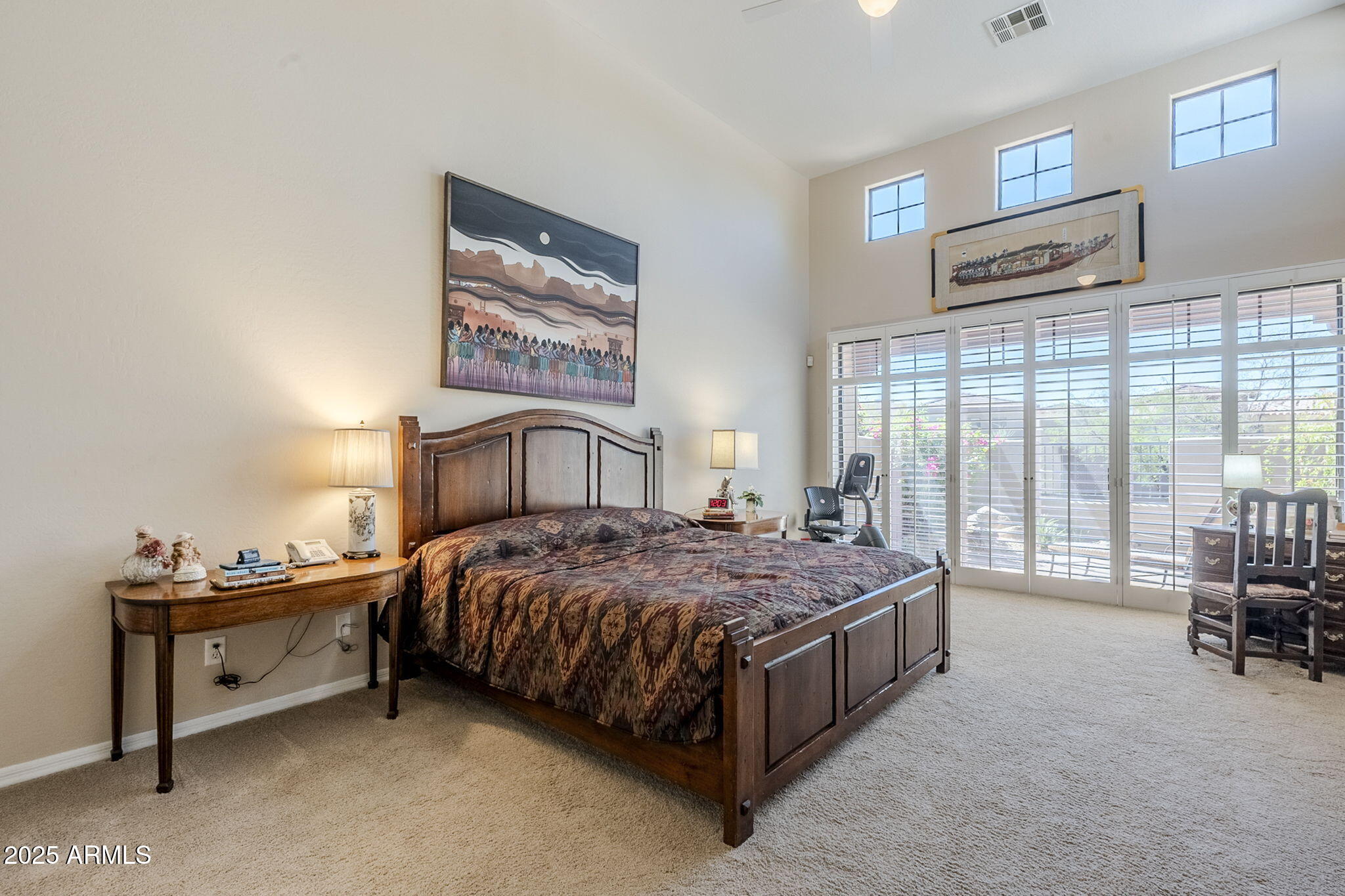 9270 East Thompson Peak Parkway, Unit 342 Scottsdale, AZ 85255 - Photo 20 of 40 a bedroom with a bed and a furniture