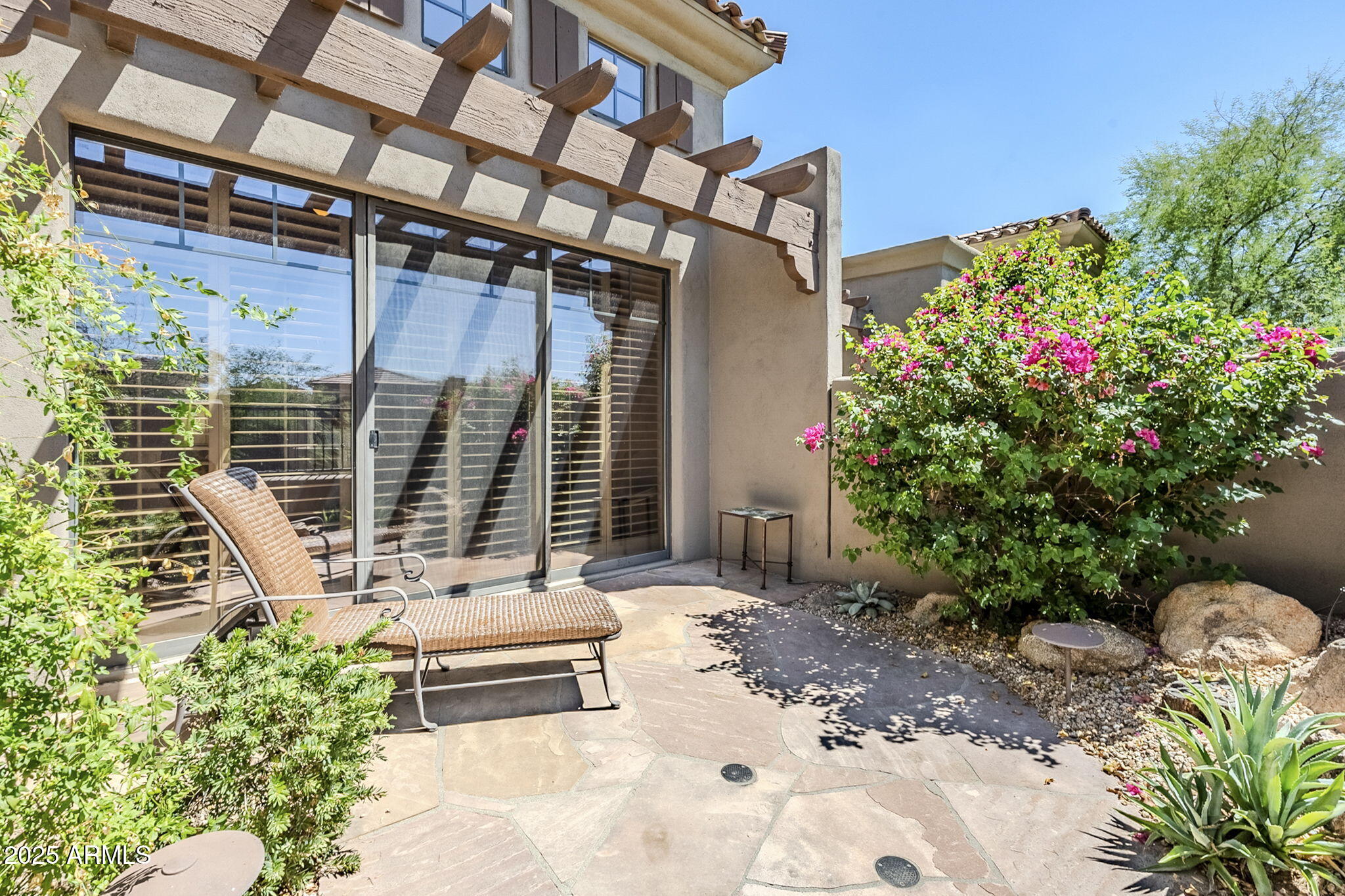 9270 East Thompson Peak Parkway, Unit 342 Scottsdale, AZ 85255 - Photo 28 of 40 a garden view with a seating space