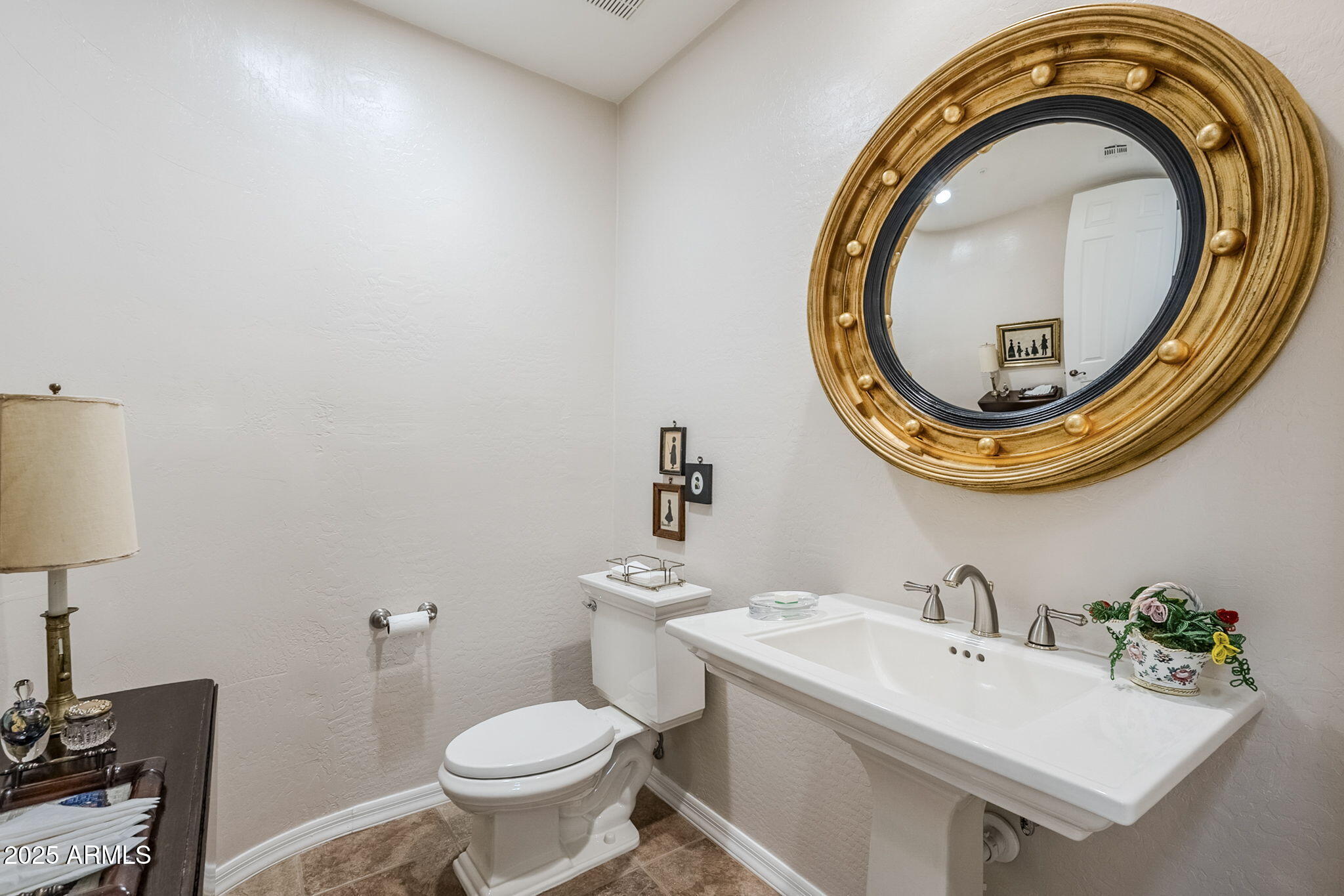 9270 East Thompson Peak Parkway, Unit 342 Scottsdale, AZ 85255 - Photo 34 of 40 a bathroom with a sink and a mirror