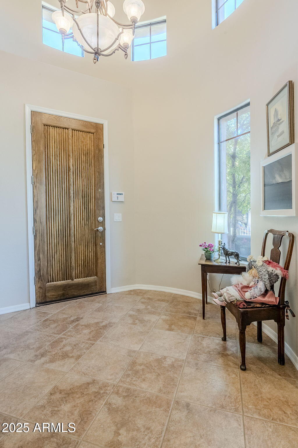 9270 East Thompson Peak Parkway, Unit 342 Scottsdale, AZ 85255 - Photo 5 of 40 a view of a room with furniture window and outside view