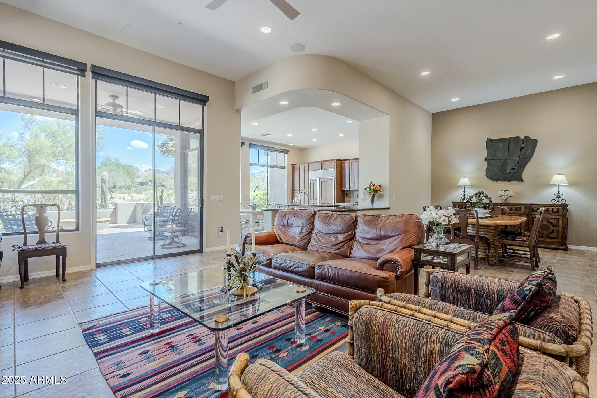 9270 East Thompson Peak Parkway, Unit 342 Scottsdale, AZ 85255 - Photo 7 of 40 a living room with furniture and wooden floor