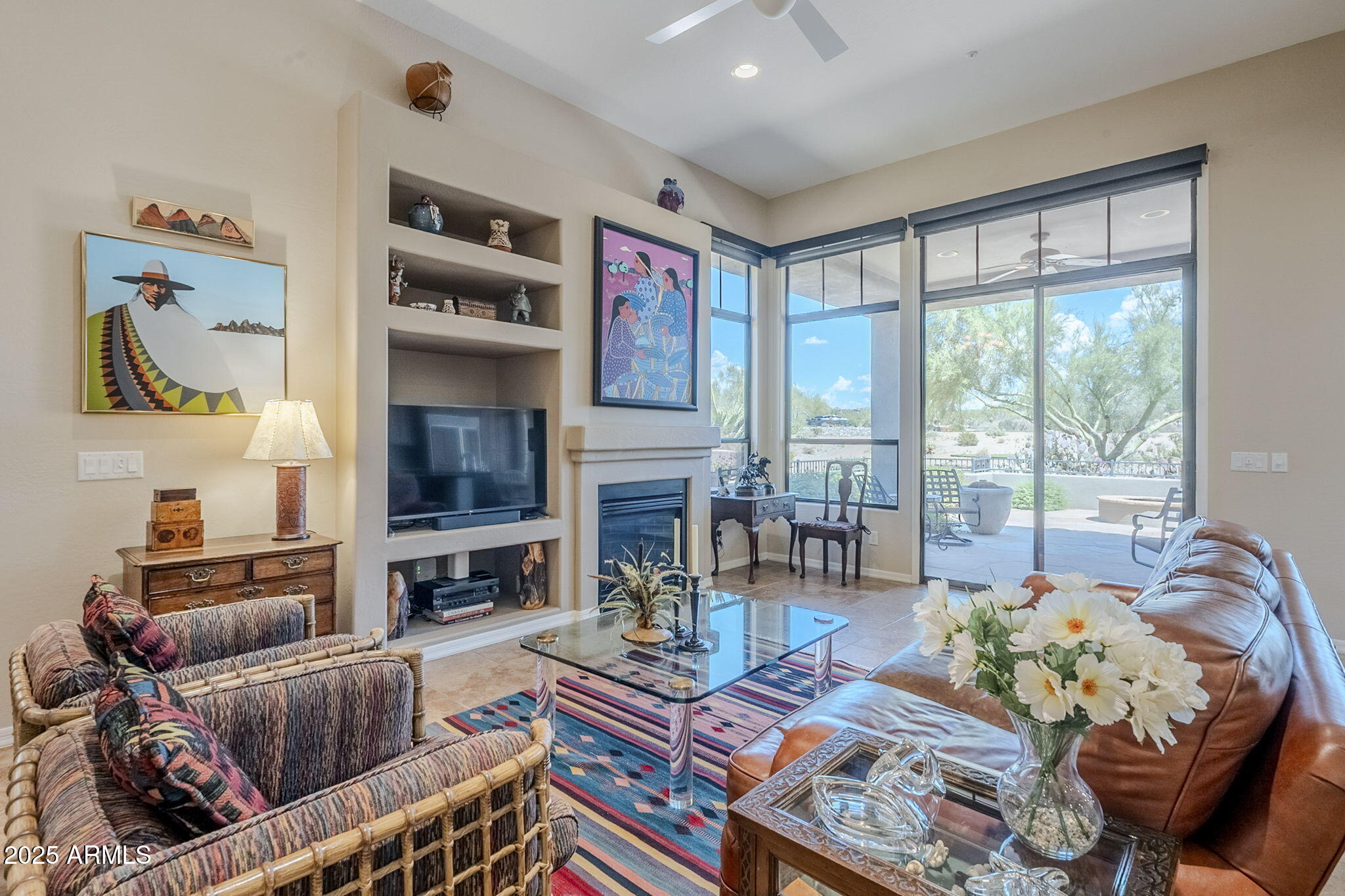 9270 East Thompson Peak Parkway, Unit 342 Scottsdale, AZ 85255 - Photo 8 of 40 a living room with furniture large window and flat screen tv