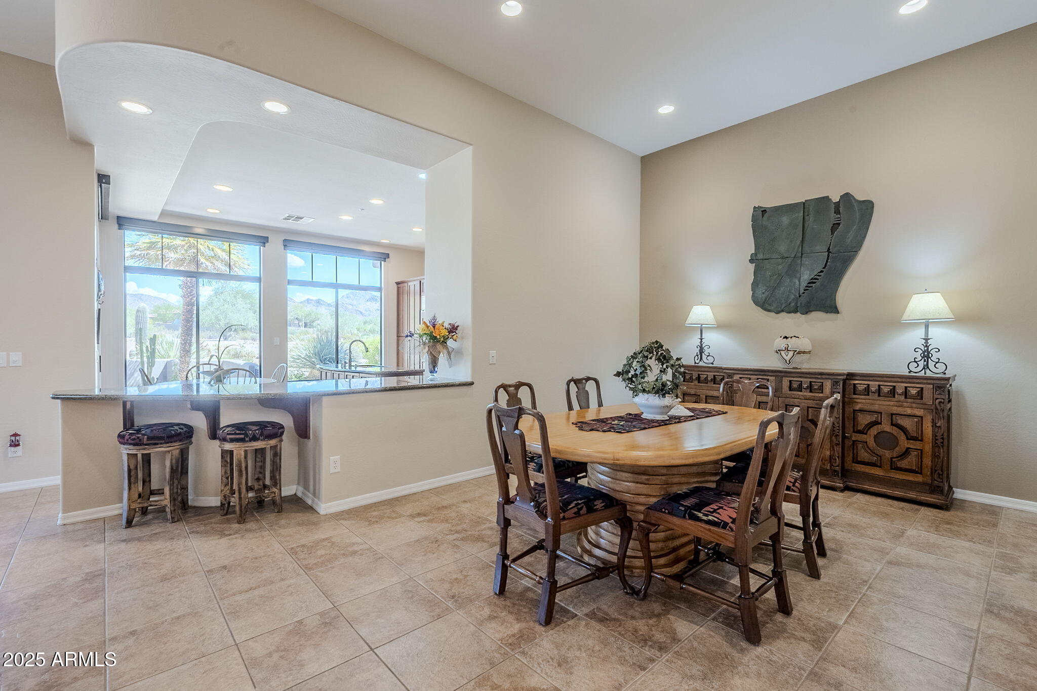 9270 East Thompson Peak Parkway, Unit 342 Scottsdale, AZ 85255 - Photo 10 of 40 a dining room with furniture and window