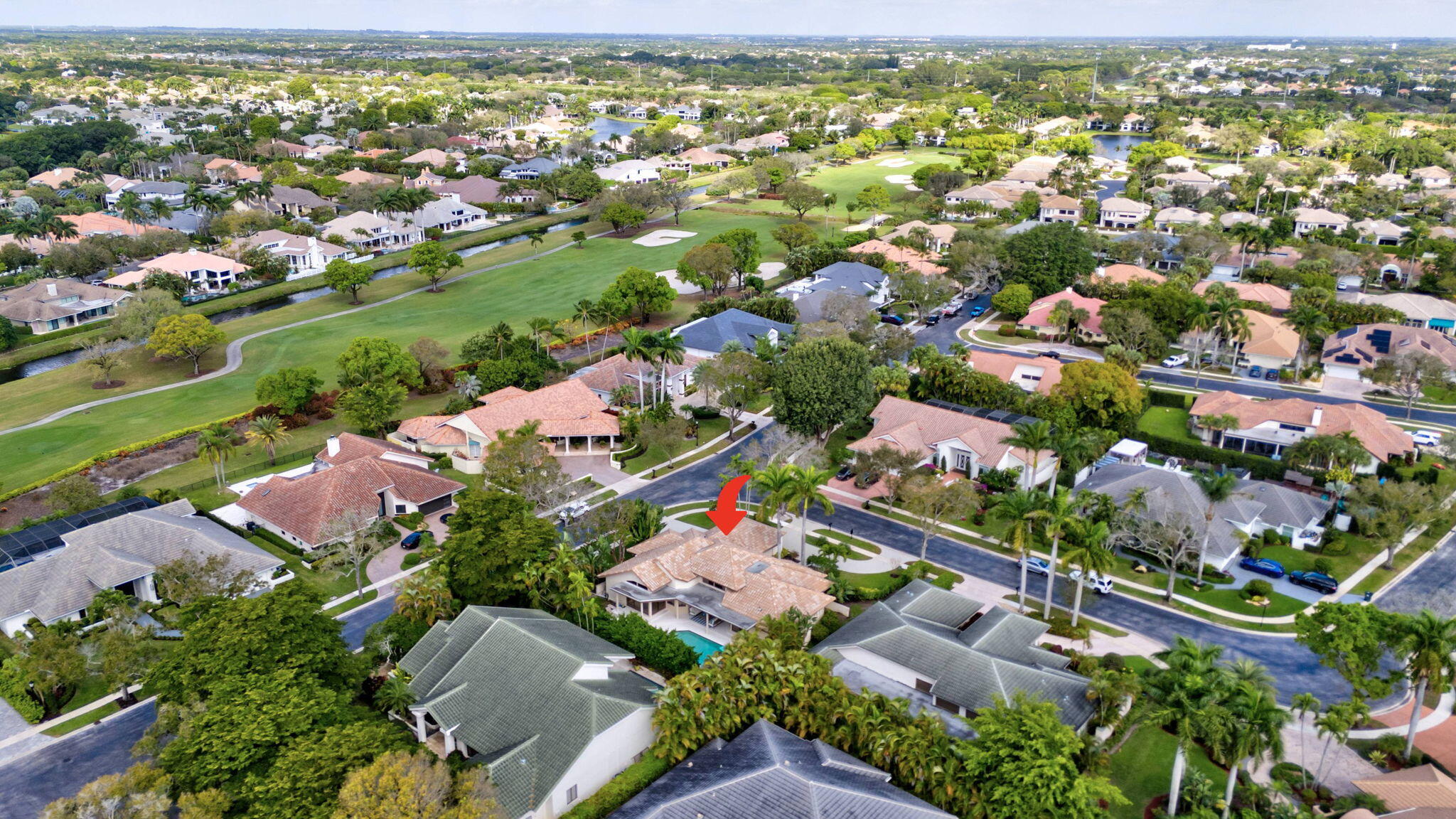2298 Northwest 57th Street Boca Raton, FL 33496 - Photo 60 of 111 an aerial view of residential houses with outdoor space and trees
