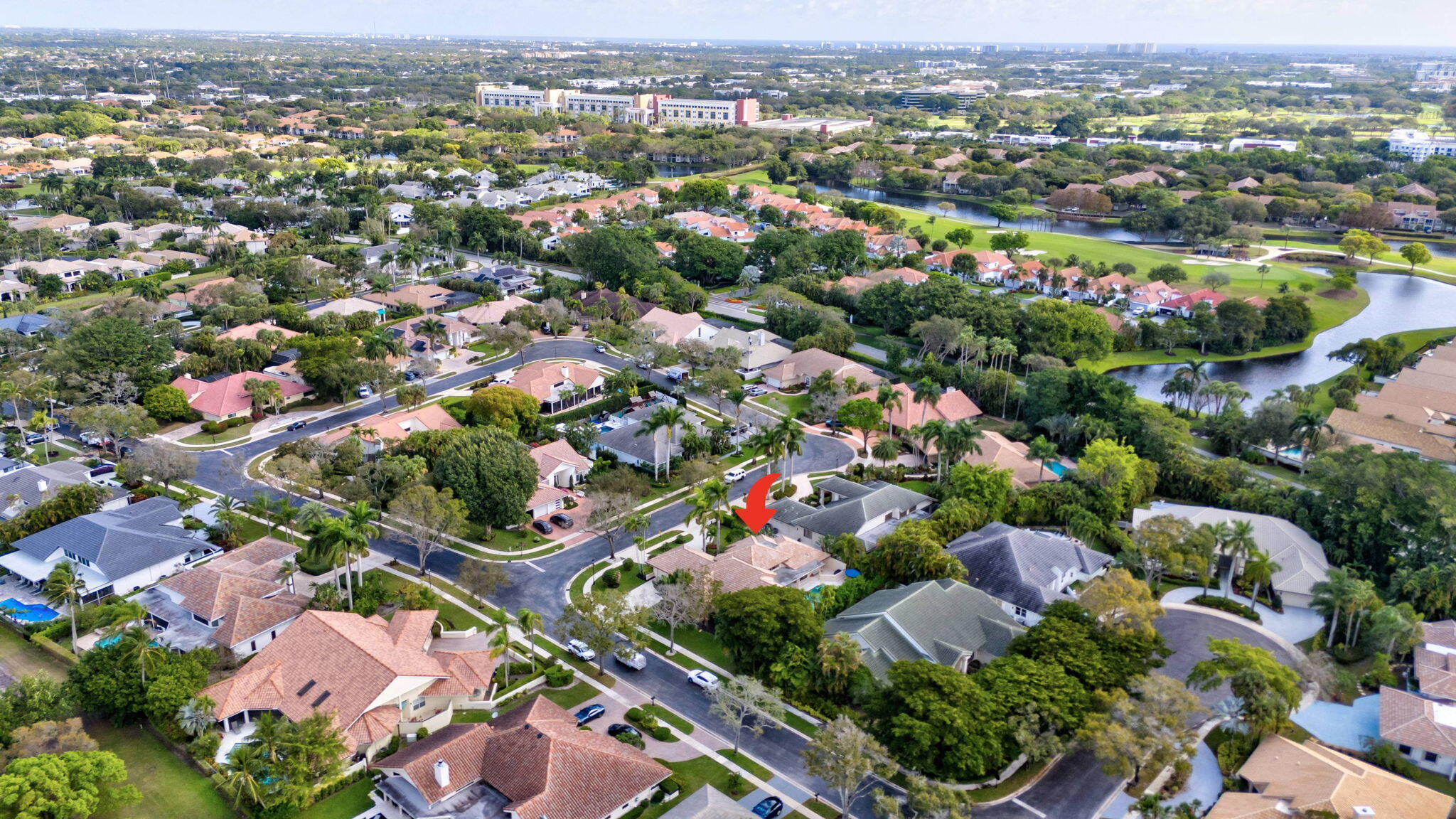 2298 Northwest 57th Street Boca Raton, FL 33496 - Photo 61 of 111 an aerial view of residential houses with outdoor space and trees