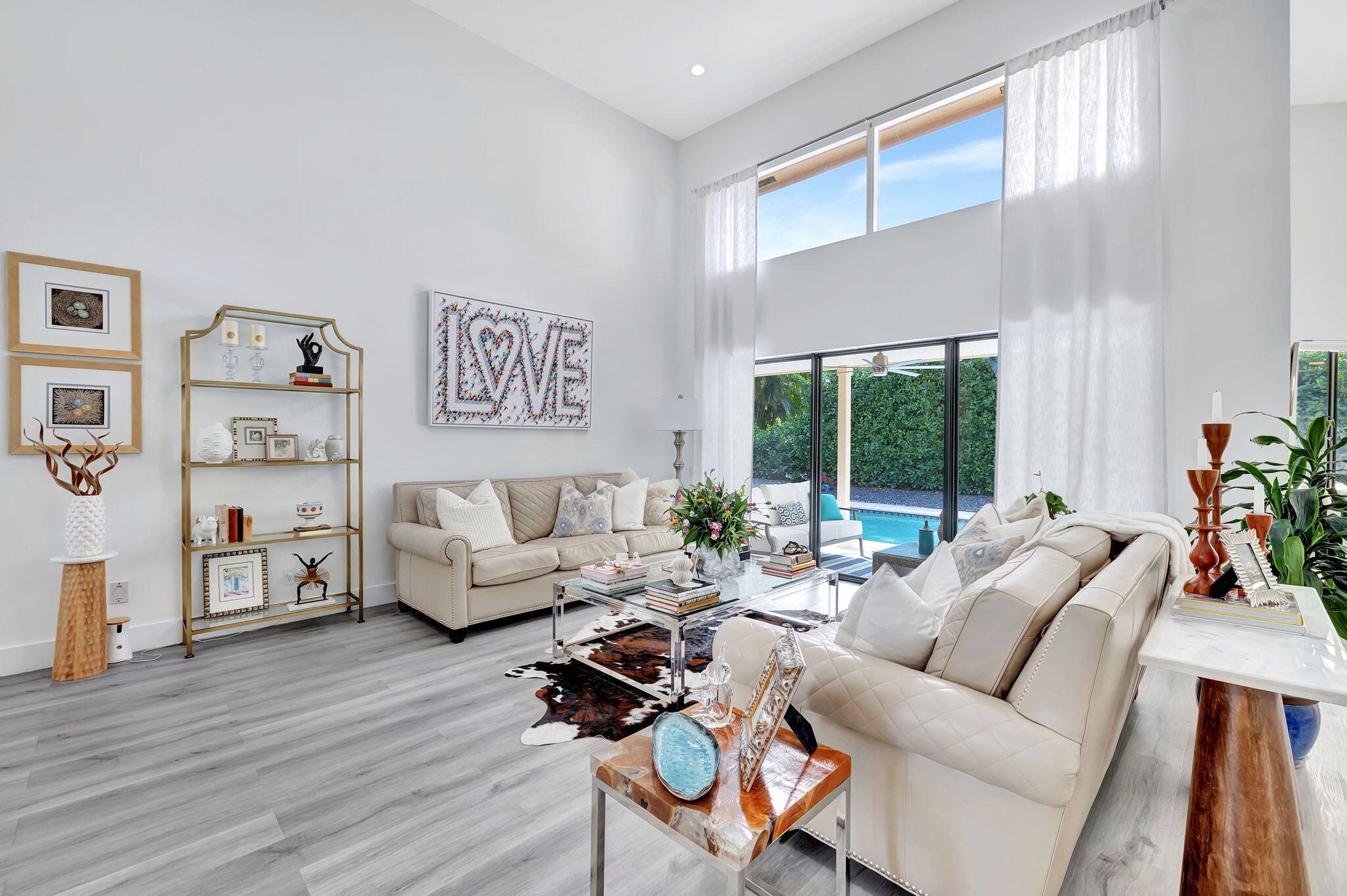 2298 Northwest 57th Street Boca Raton, FL 33496 - Photo 9 of 111 a living room with furniture and a large window