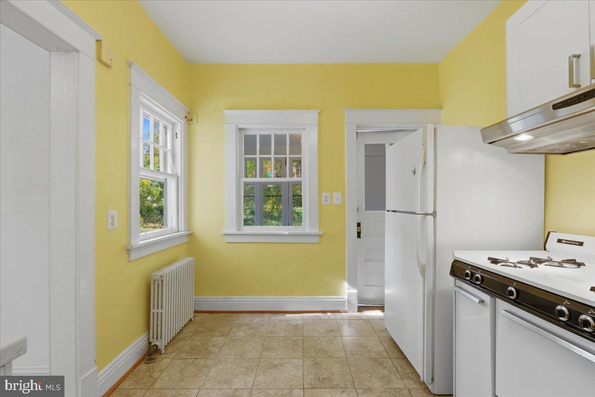 5900 32nd Street Northwest Washington, DC 20015 - Photo 17 of 51 a view of a kitchen that shows a sink and a dishwasher in it
