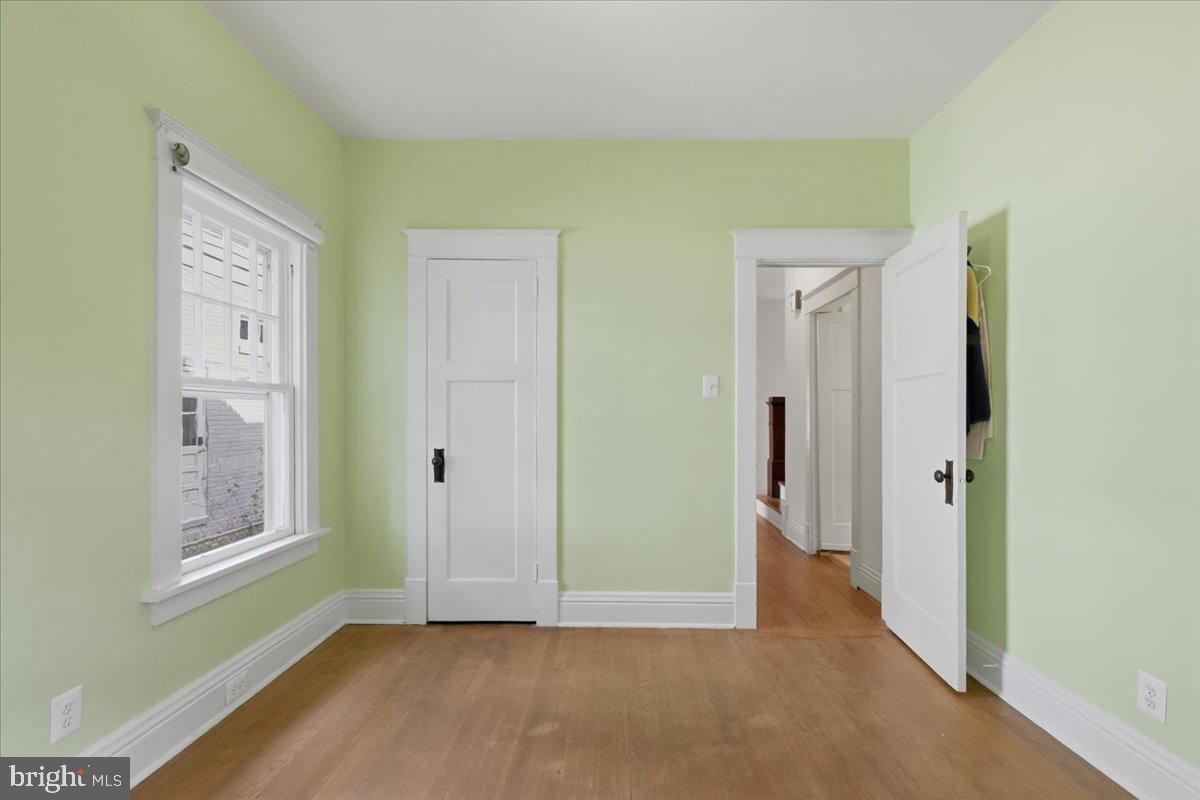 5900 32nd Street Northwest Washington, DC 20015 - Photo 19 of 51 a view of an empty room with window and closet area
