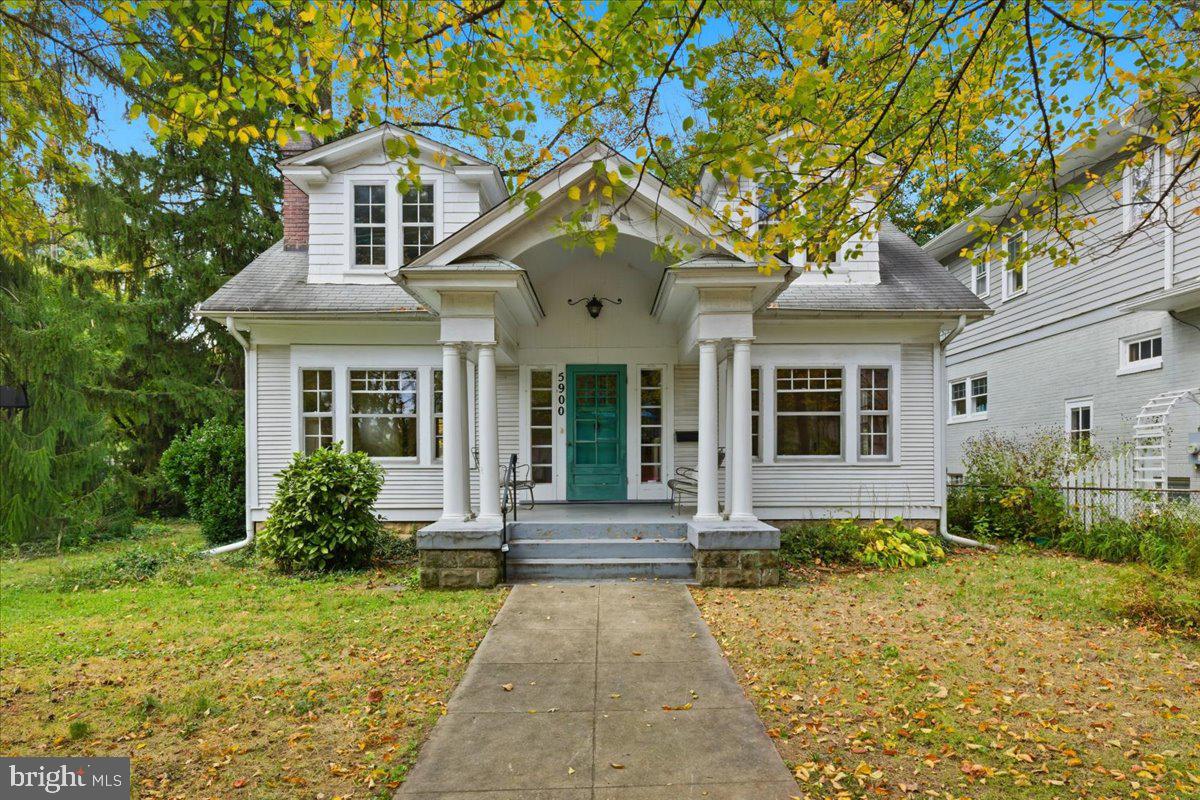 5900 32nd Street Northwest Washington, DC 20015 - Photo 2 of 51 a front view of a house with garden
