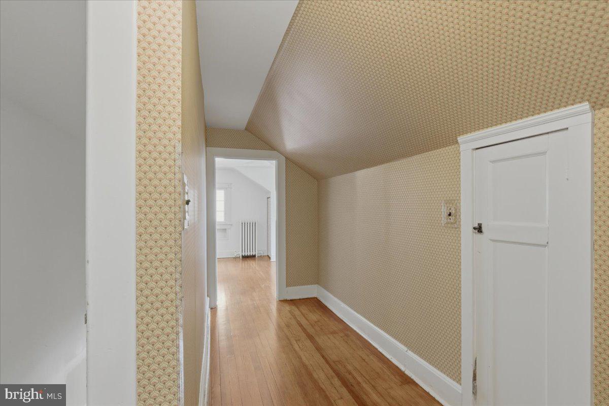 5900 32nd Street Northwest Washington, DC 20015 - Photo 26 of 51 a view of a hallway with wooden floor and closet