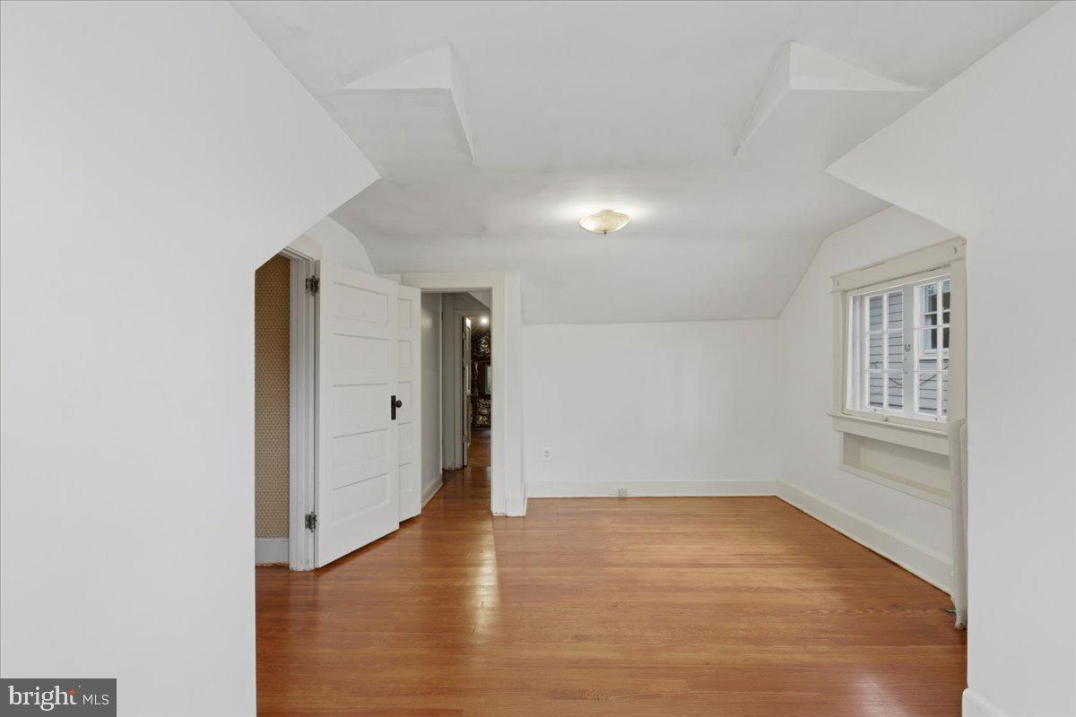 5900 32nd Street Northwest Washington, DC 20015 - Photo 33 of 51 an empty room with wooden floor and windows
