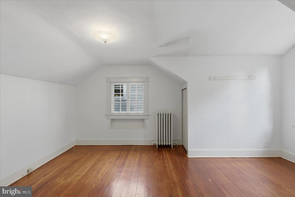 5900 32nd Street Northwest Washington, DC 20015 - Photo 34 of 51 an empty room with wooden floor and windows