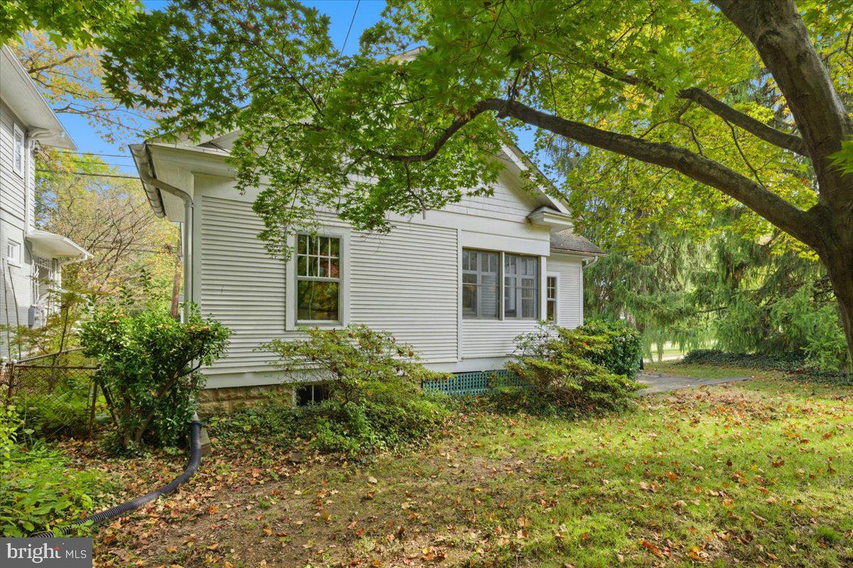 5900 32nd Street Northwest Washington, DC 20015 - Photo 44 of 51 a view of a house with a yard and plants