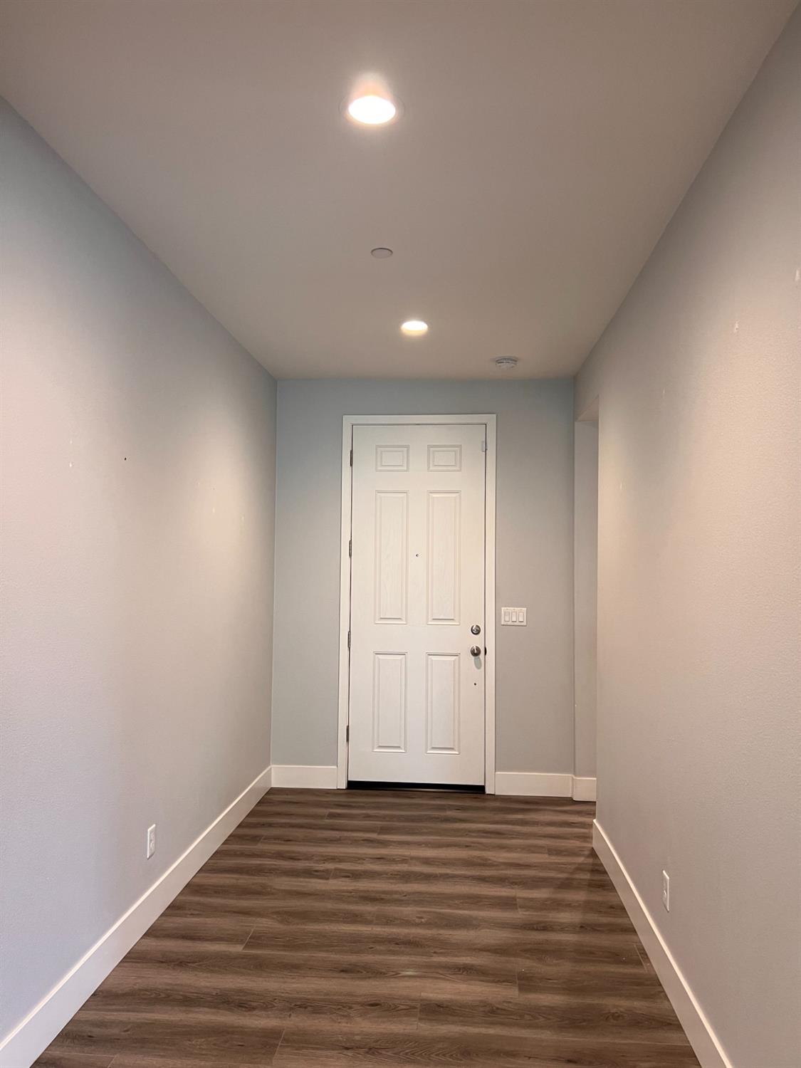 445 Expedition Avenue Madera, CA 93636 - Photo 3 of 36 a view of a livingroom with wooden floor