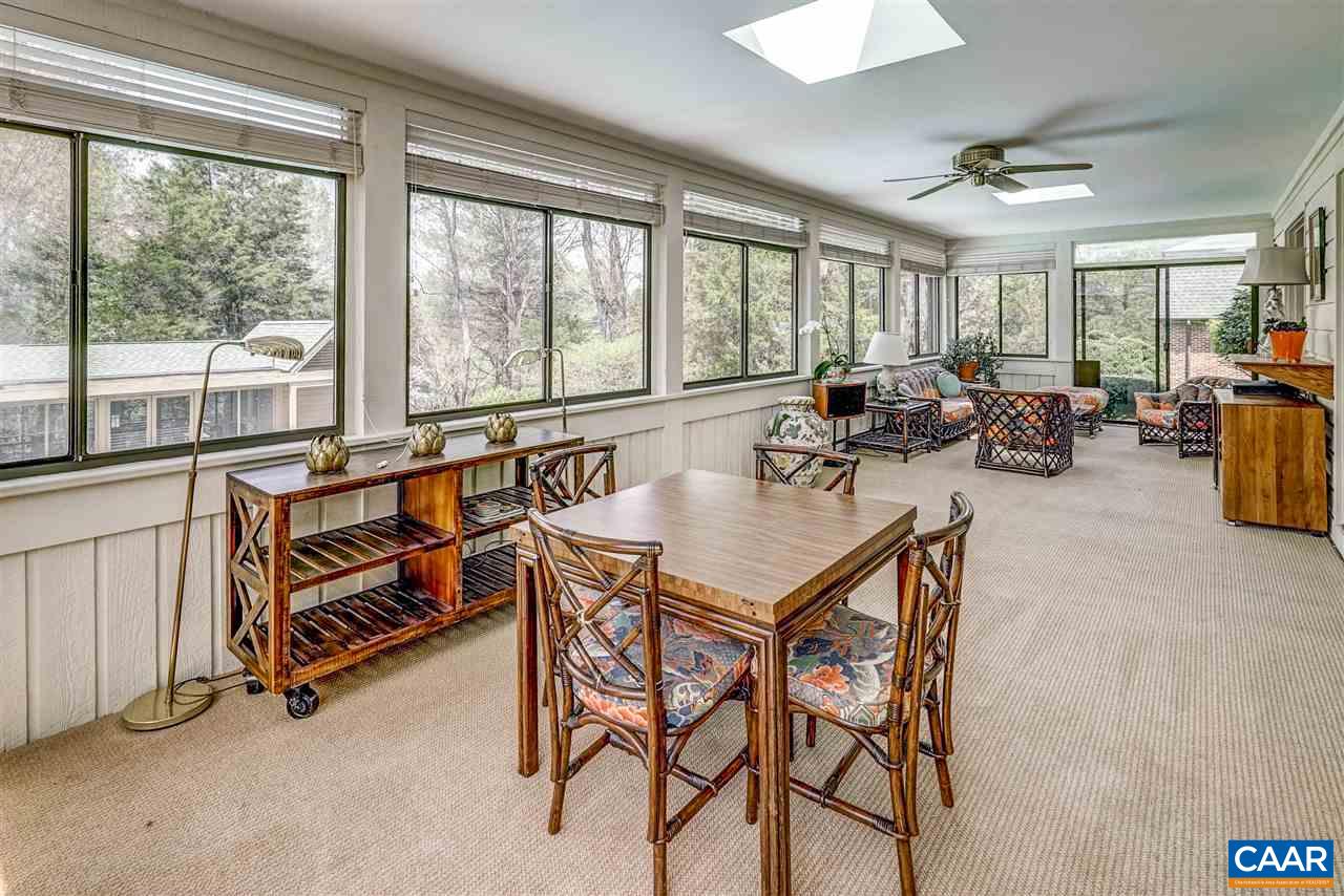 1730 Lambs Road Charlottesville, VA 22901 - Photo 33 of 50 a view of a dining room and livingroom with furniture window and outside view