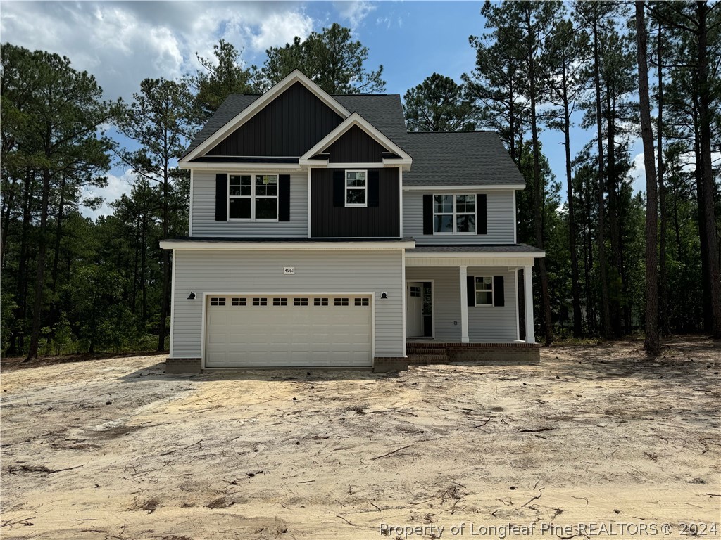 4961 Calloway Road Raeford, NC 28376 - Photo 1 of 7 a front view of a house with a yard