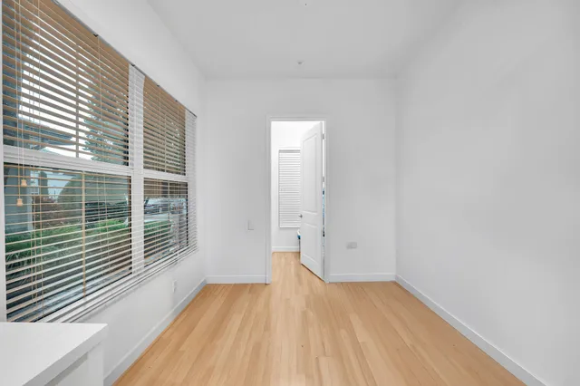 a en suite bathroom with a double sink and mirror