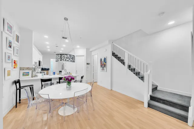 a view of a kitchen with washer and dryer