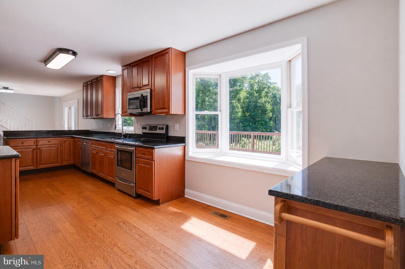 10461 Old Stillhouse Road Boston, VA 22713 - Photo 6 of 63 Bright kitchen with modern finishes.
