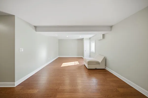 a hallway with wooden floor