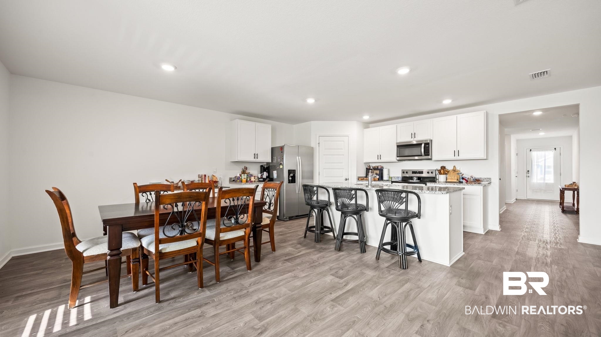 24264 Veranda Circle Elberta, AL 36530 - Photo 19 of 41 Dining space with light wood-style floors and recessed lighting