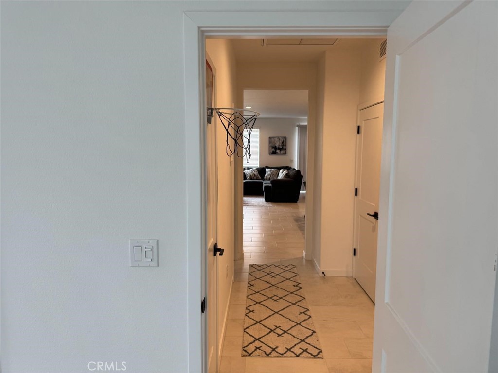 4035 Braden Road Madera, CA 93636 - Photo 25 of 29 a view of a bedroom from a hallway