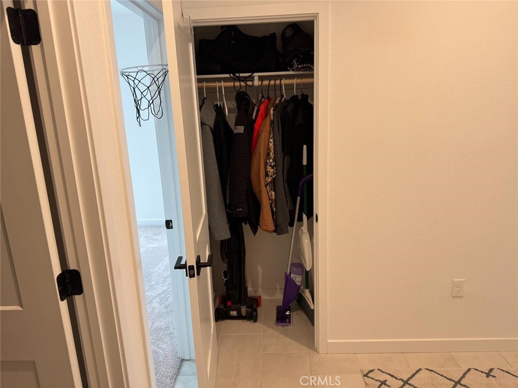 4035 Braden Road Madera, CA 93636 - Photo 27 of 29 a view of walk in closet with clothes