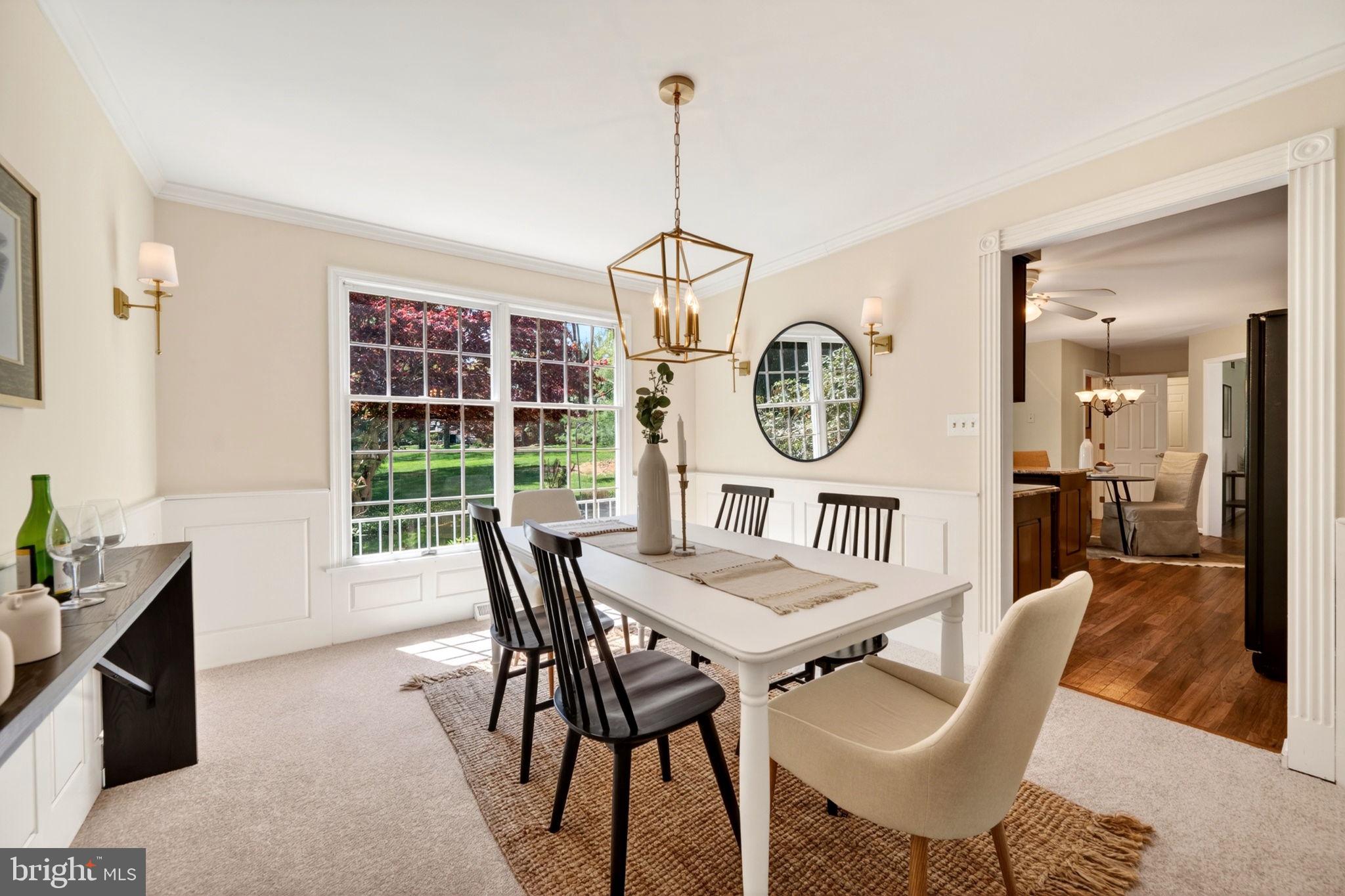 3805 Duddington Way Phoenix, MD 21131 - Photo 13 of 69 a view of a dining room with furniture window and wooden floor
