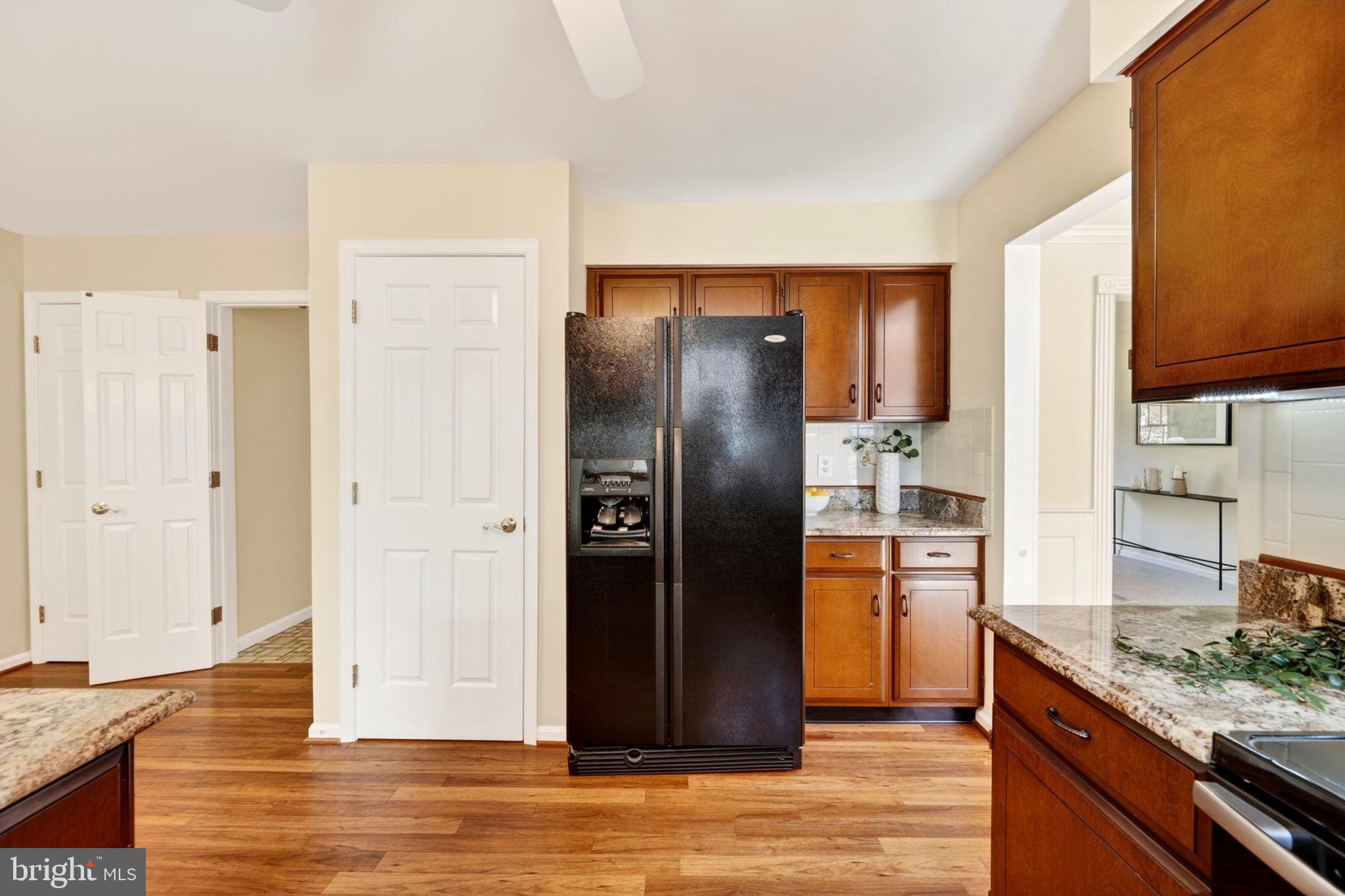 3805 Duddington Way Phoenix, MD 21131 - Photo 22 of 69 a kitchen with stainless steel appliances granite countertop a refrigerator and a sink