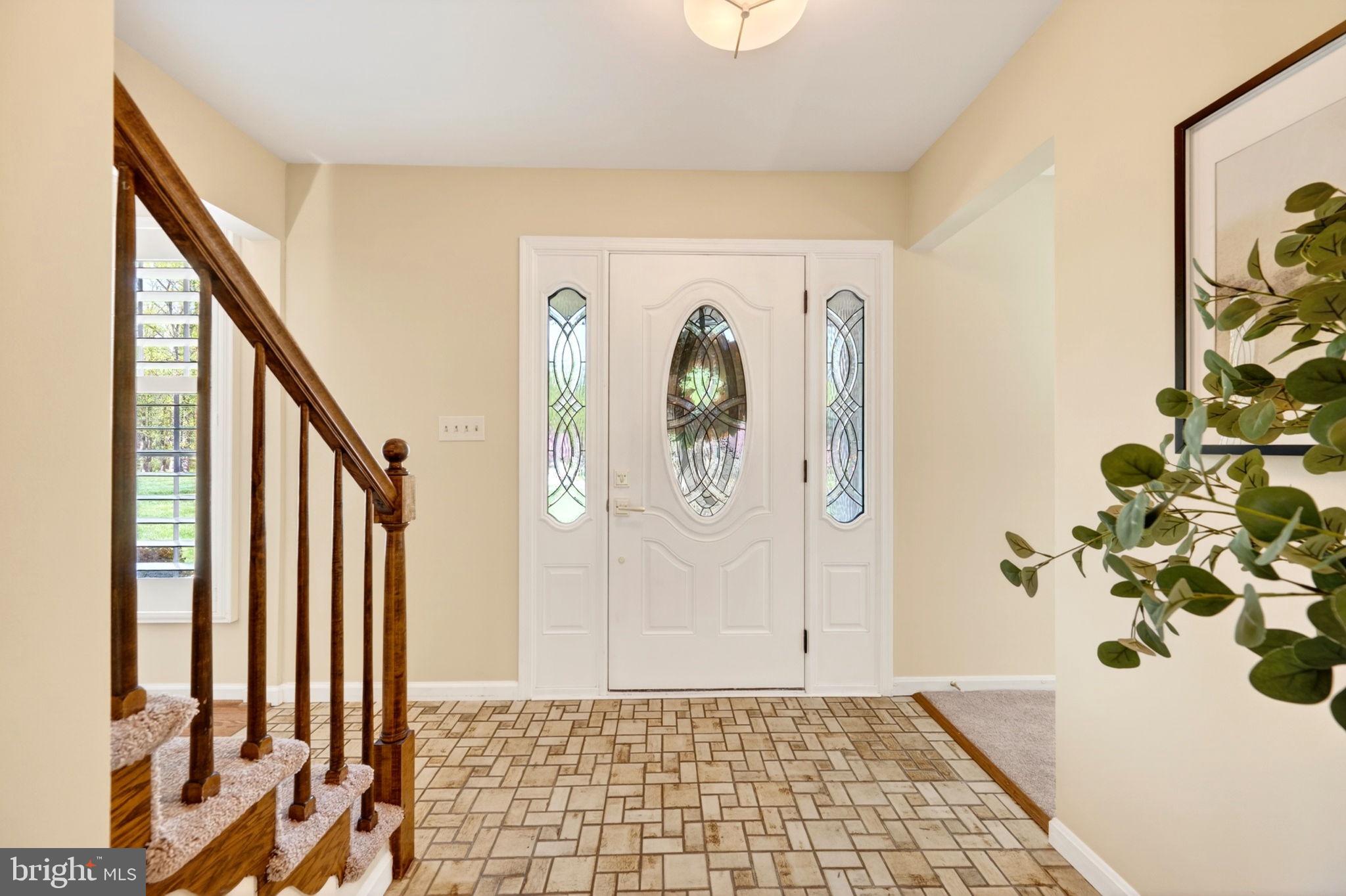 3805 Duddington Way Phoenix, MD 21131 - Photo 26 of 69 a view of a entryway door with wooden floor