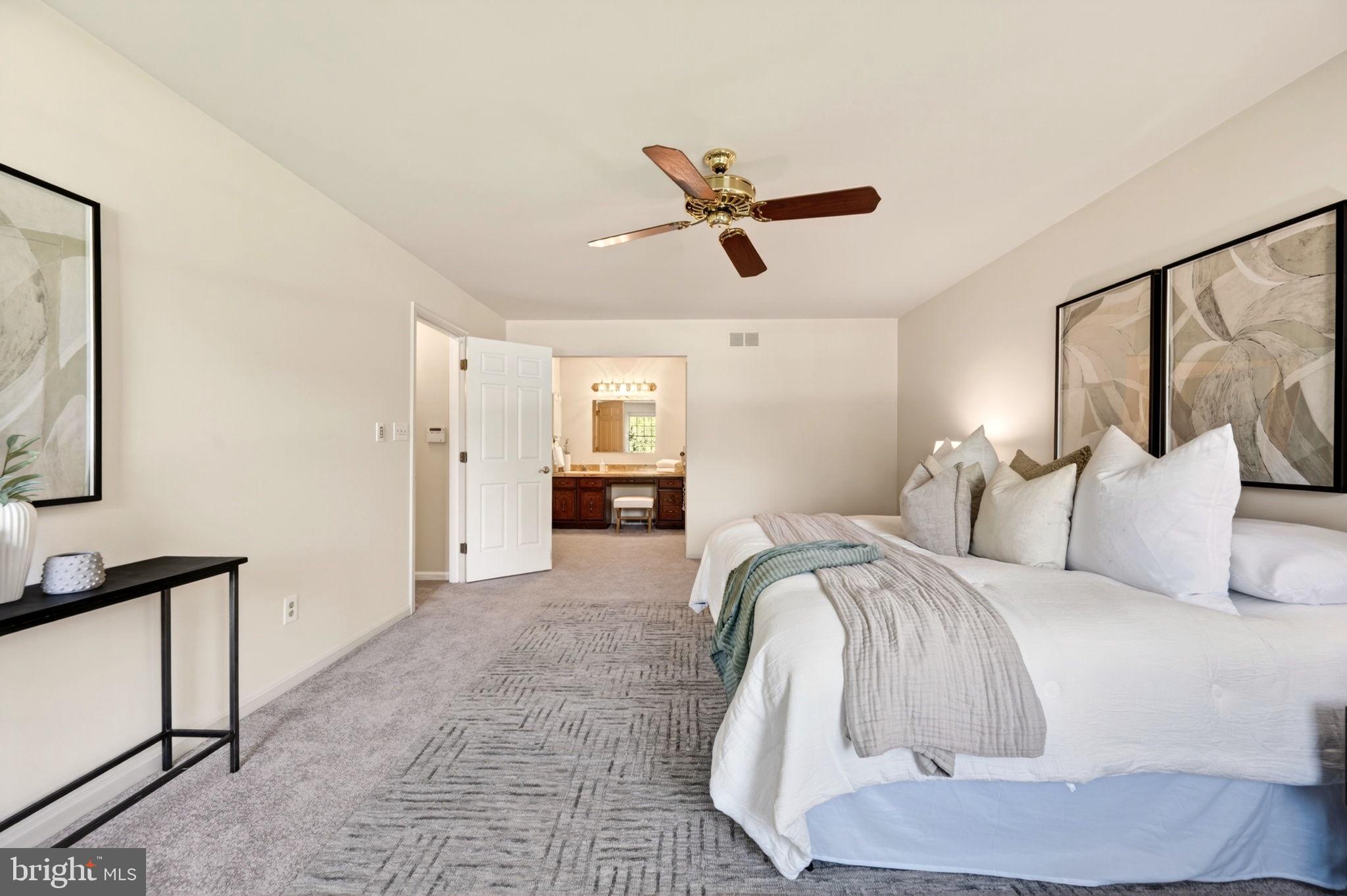 3805 Duddington Way Phoenix, MD 21131 - Photo 29 of 69 a bedroom with a bed and a painting on the wall