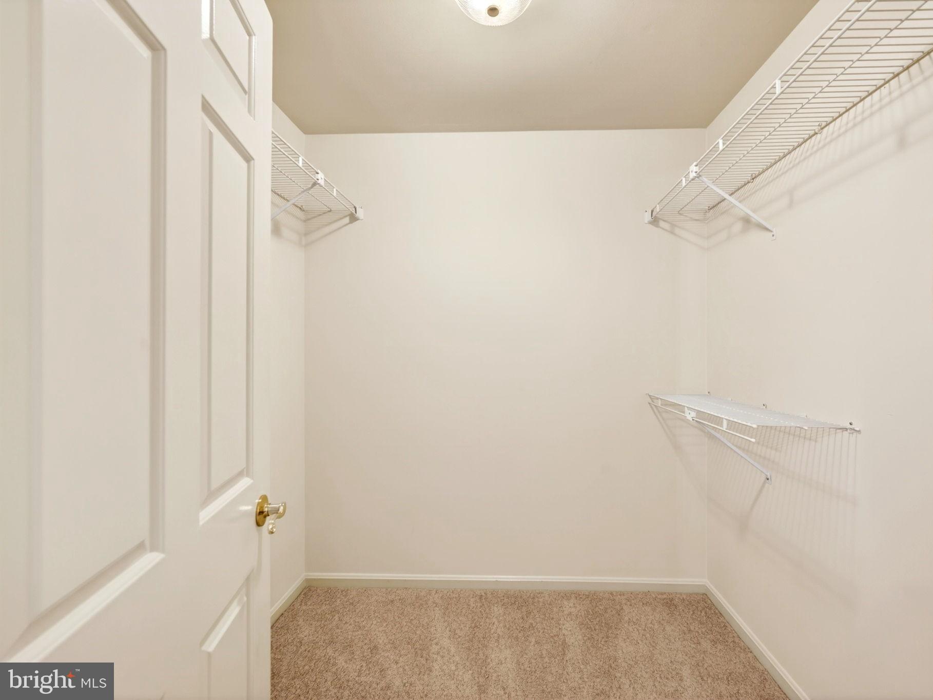 3805 Duddington Way Phoenix, MD 21131 - Photo 30 of 69 a view of small space with racks on the wall